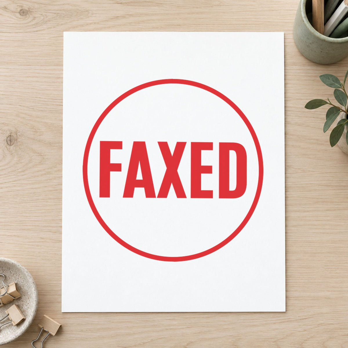 Marking a page "Faxed" with the Xstamper Faxed Record Stamp – Round Pre-Inked