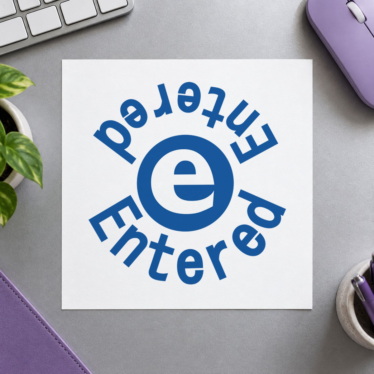 "Entered" imprint stamped on a document with the Xstamper Entered Data Entry Stamp – Round Blue Pre-Inked
