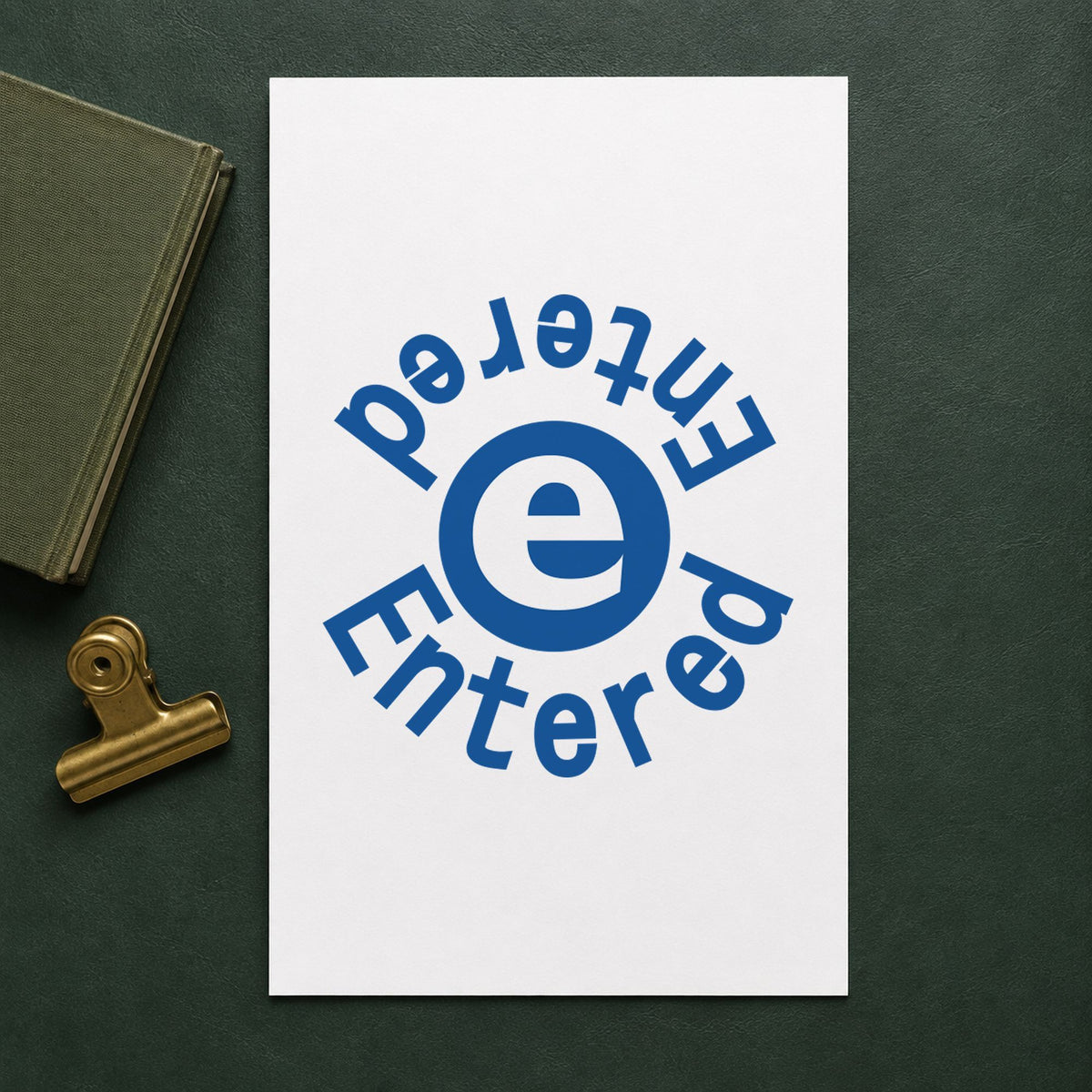 "Entered" stamp impression made with pre-inked Xstamper 11423