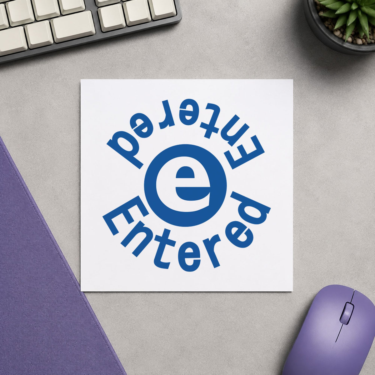 Xstamper Entered Data Entry Stamp – Round Blue Pre-Inked leaving a clean "Entered" impression