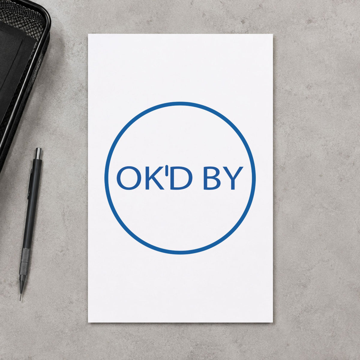 "OK'd by" stamp impression made with pre-inked Xstamper 11358