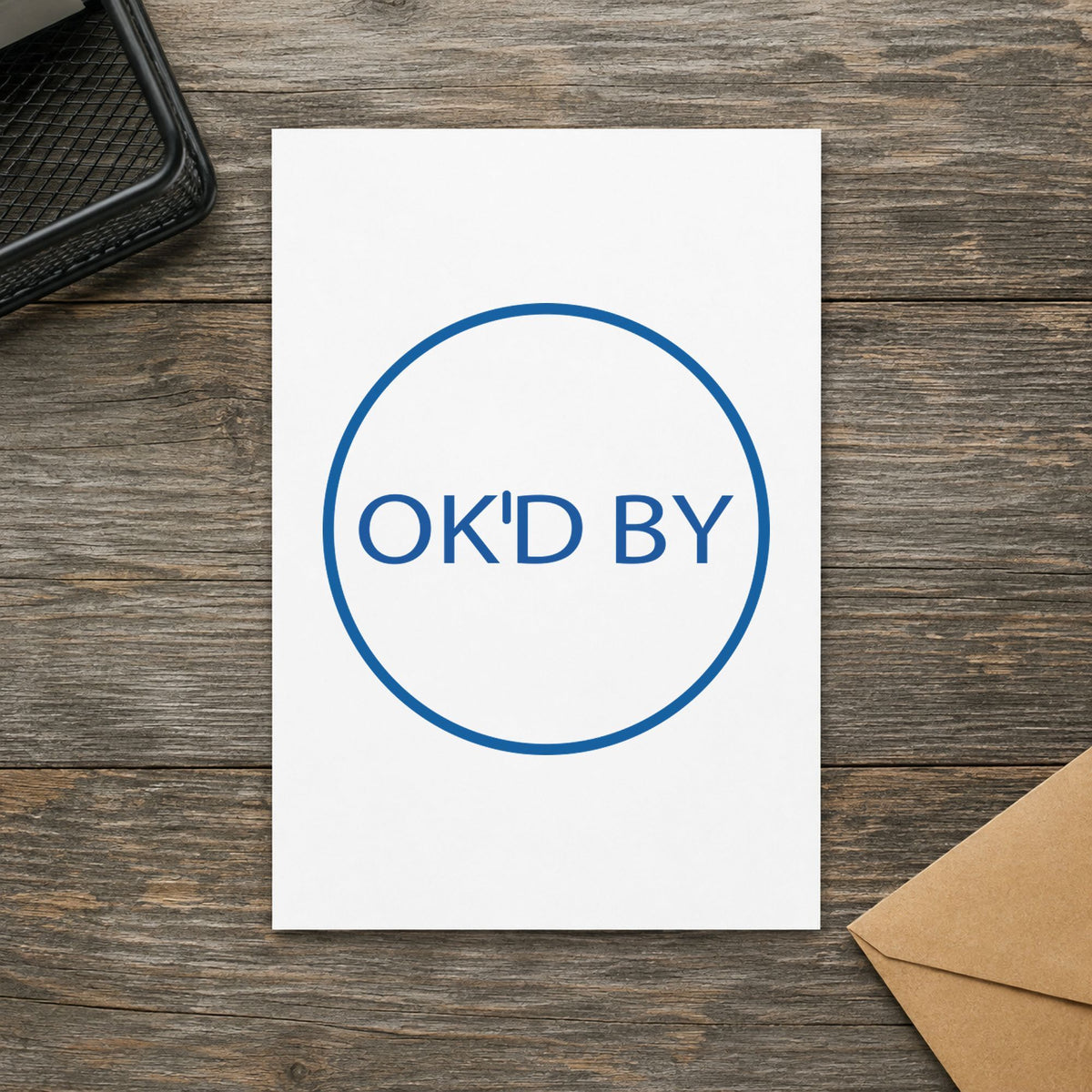 Marking a page "OK'd by" with the Xstamper OK'd By Approval Stamp – Round Pre-Inked
