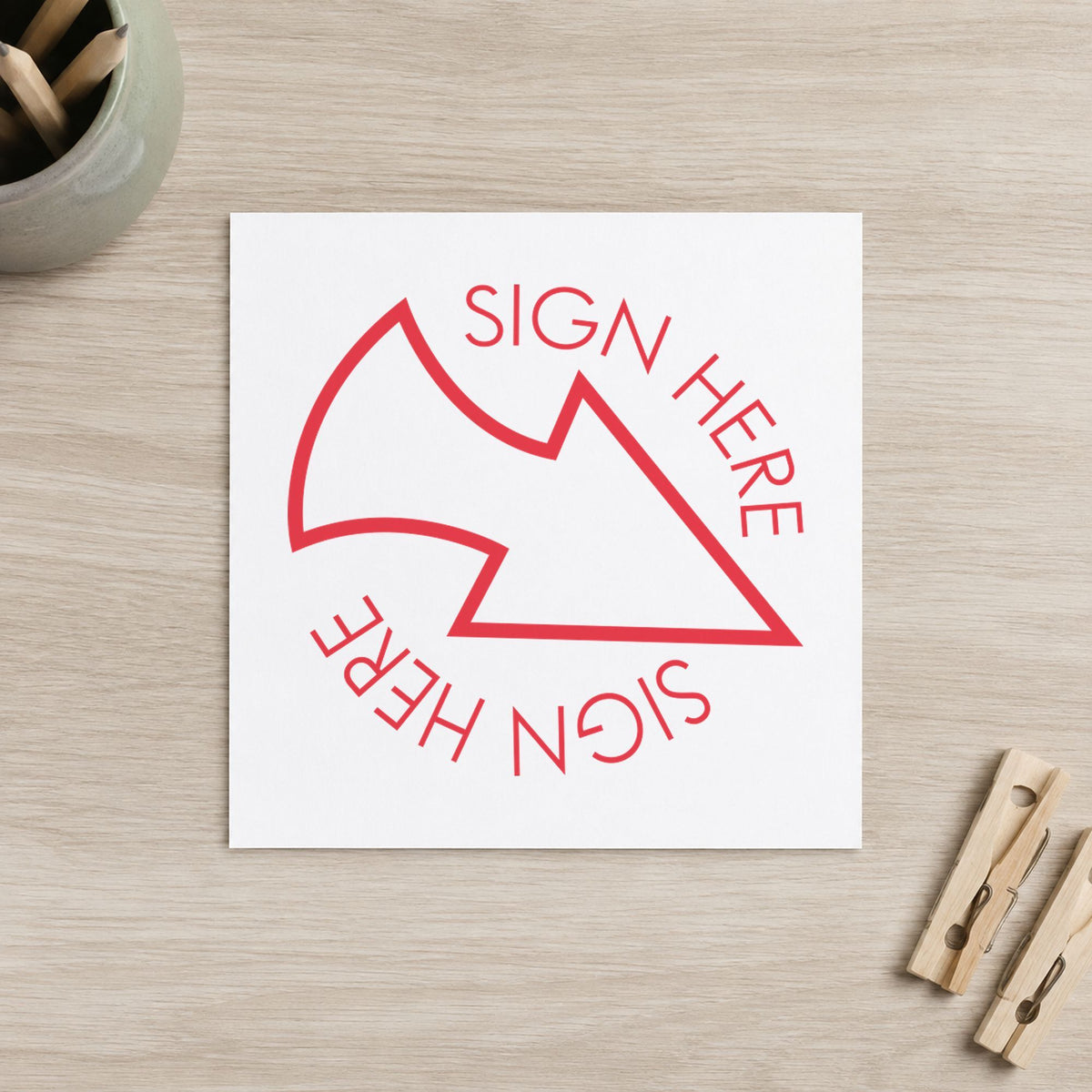 Crisp "Sign here" imprint produced by the Round Red Sign Here Stamp