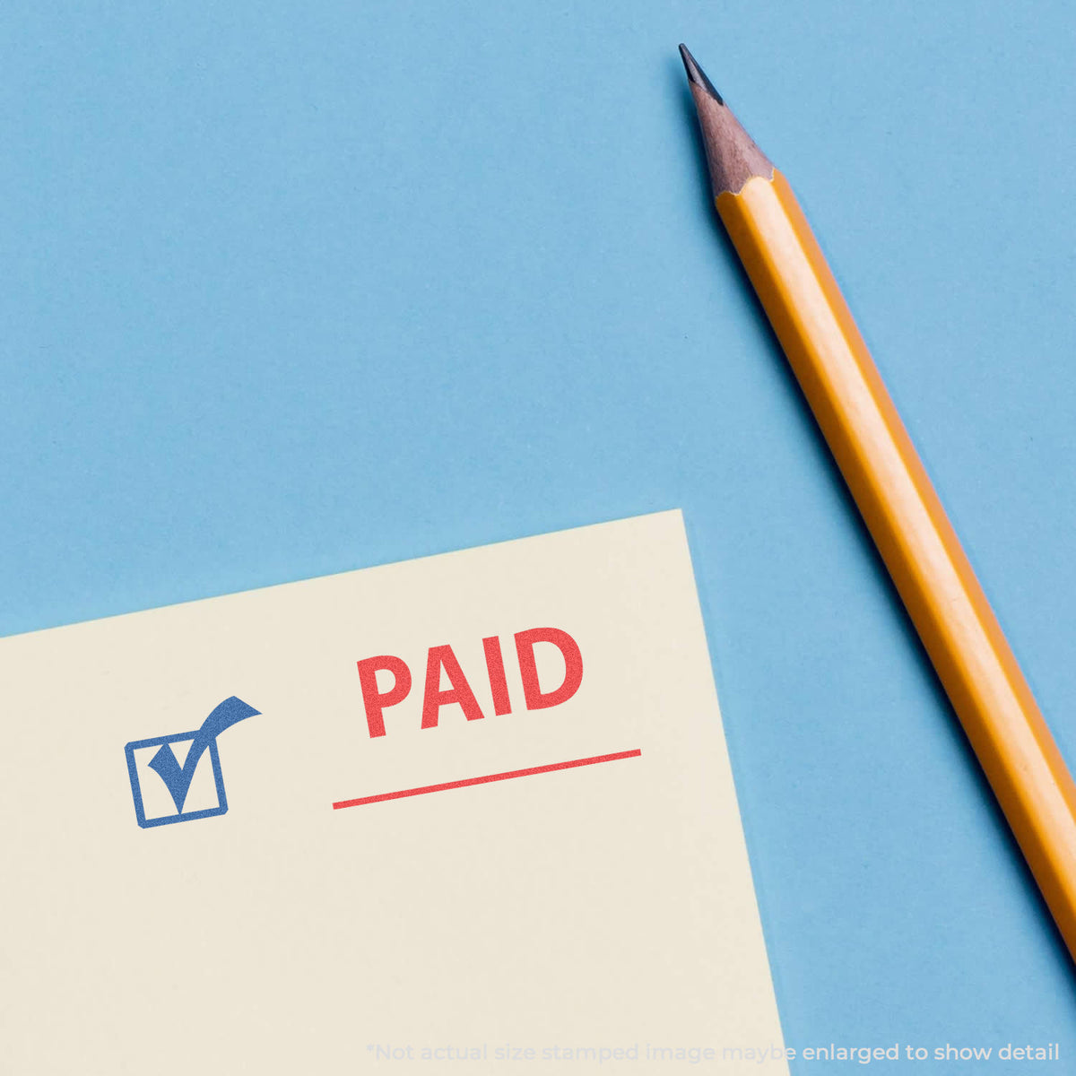 "Paid" mark stamped for document handling, Xstamper 2024 stamp