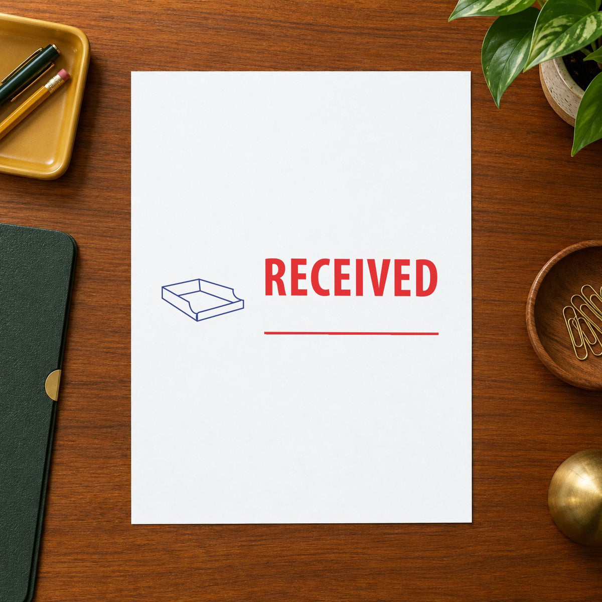 "Received" imprint at 1-5/8 x 1/2 in, no separate ink pad required