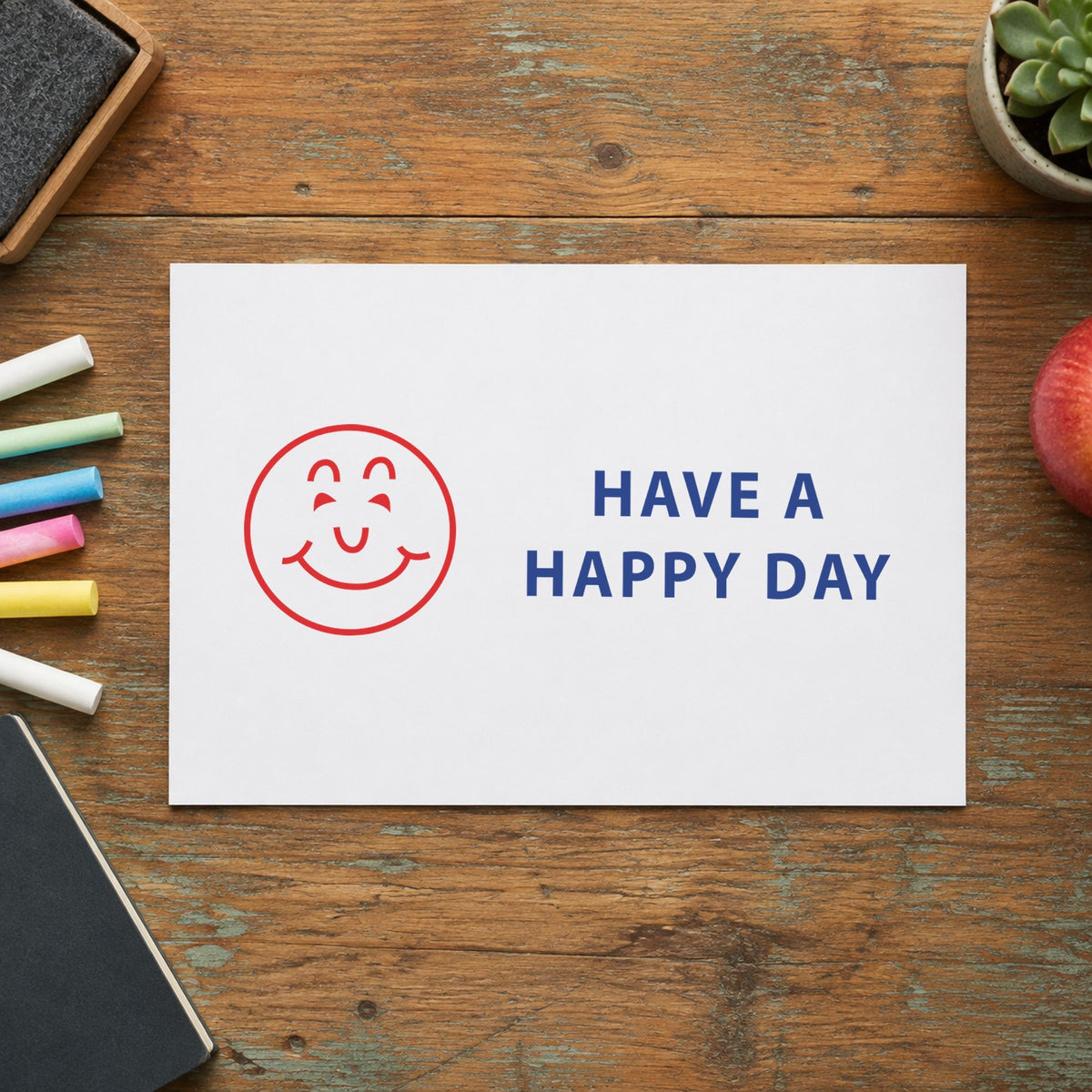 "Have a happy day" impression shown close up, rectangular imprint at 1-5/8 x 1/2 in