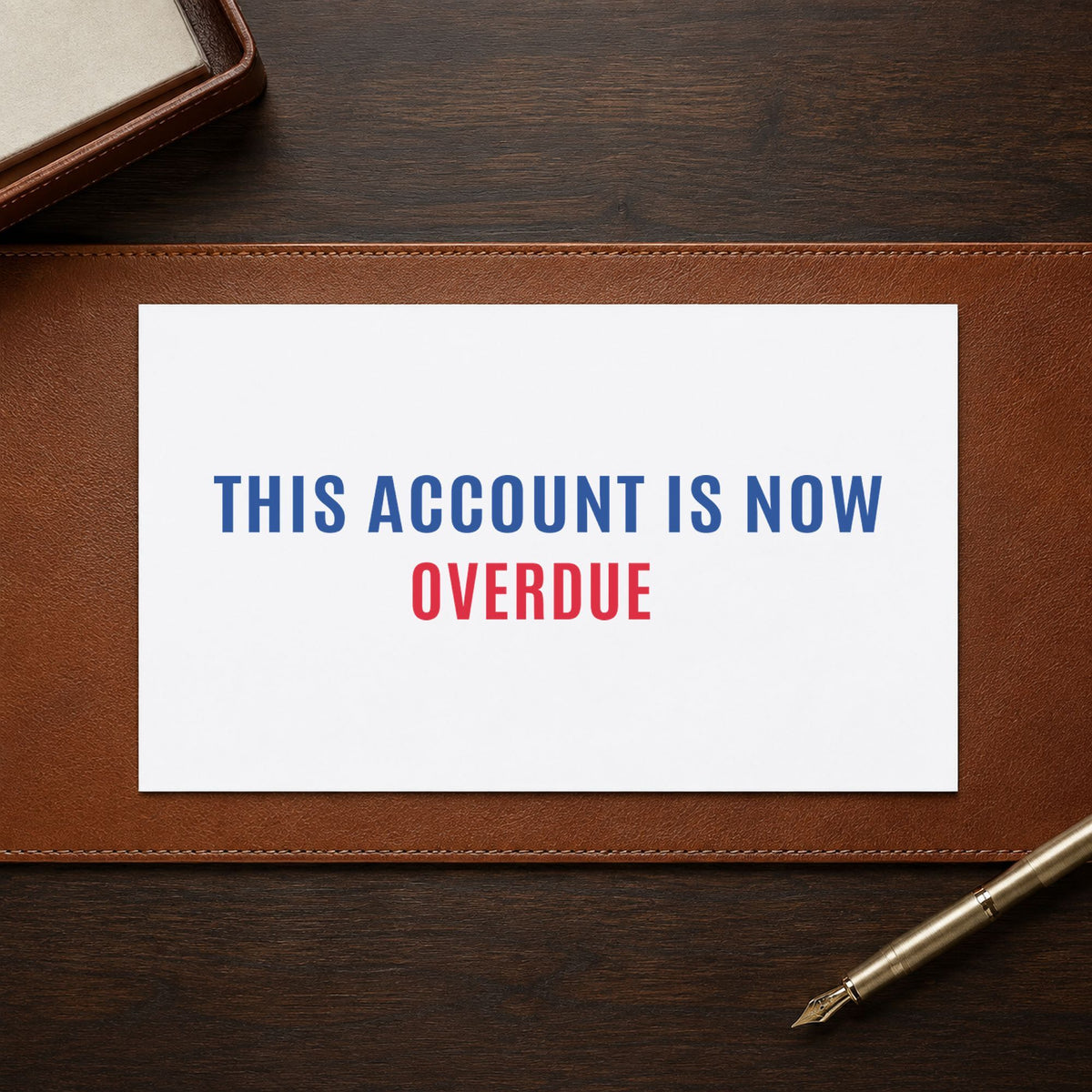 "This account is now overdue" imprint stamped on a document with the Xstamper This Account Is Now Overdue Billing Stamp