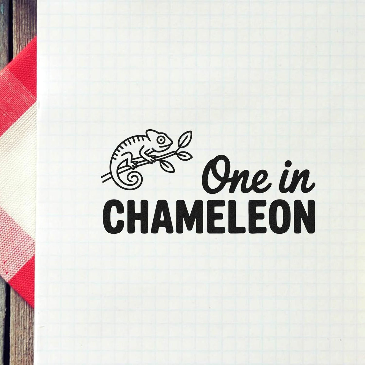 One in Chameleon rubber stamp design with chameleon illustration for custom animal-themed stamping.