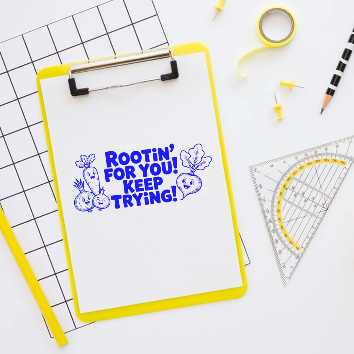 Motivational rubber stamp design reading Rootin for You! Keep Trying! with cute vegetable illustrations on a clipboard.