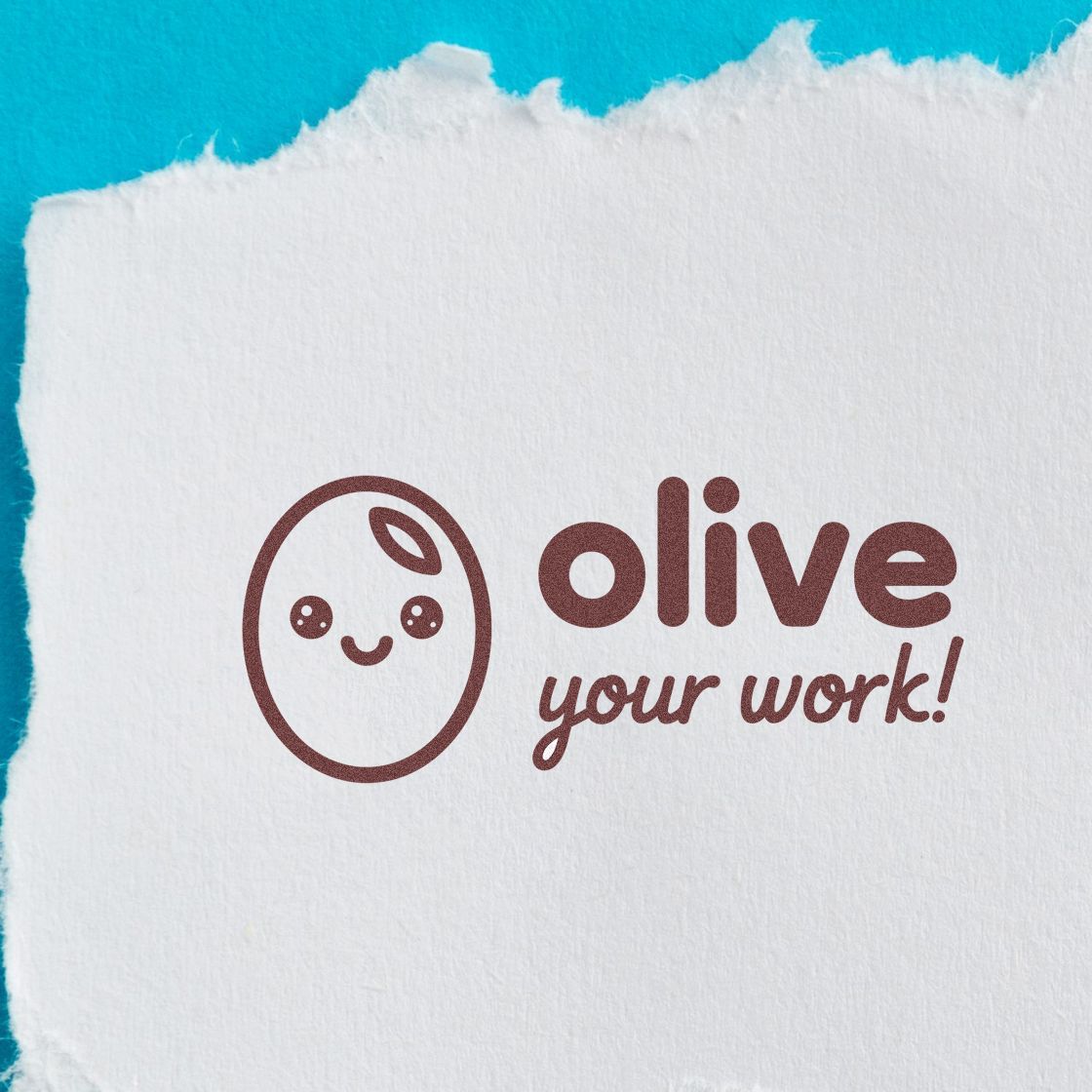 Custom rubber stamp impression with smiling olive icon and olive your work! slogan on white paper.