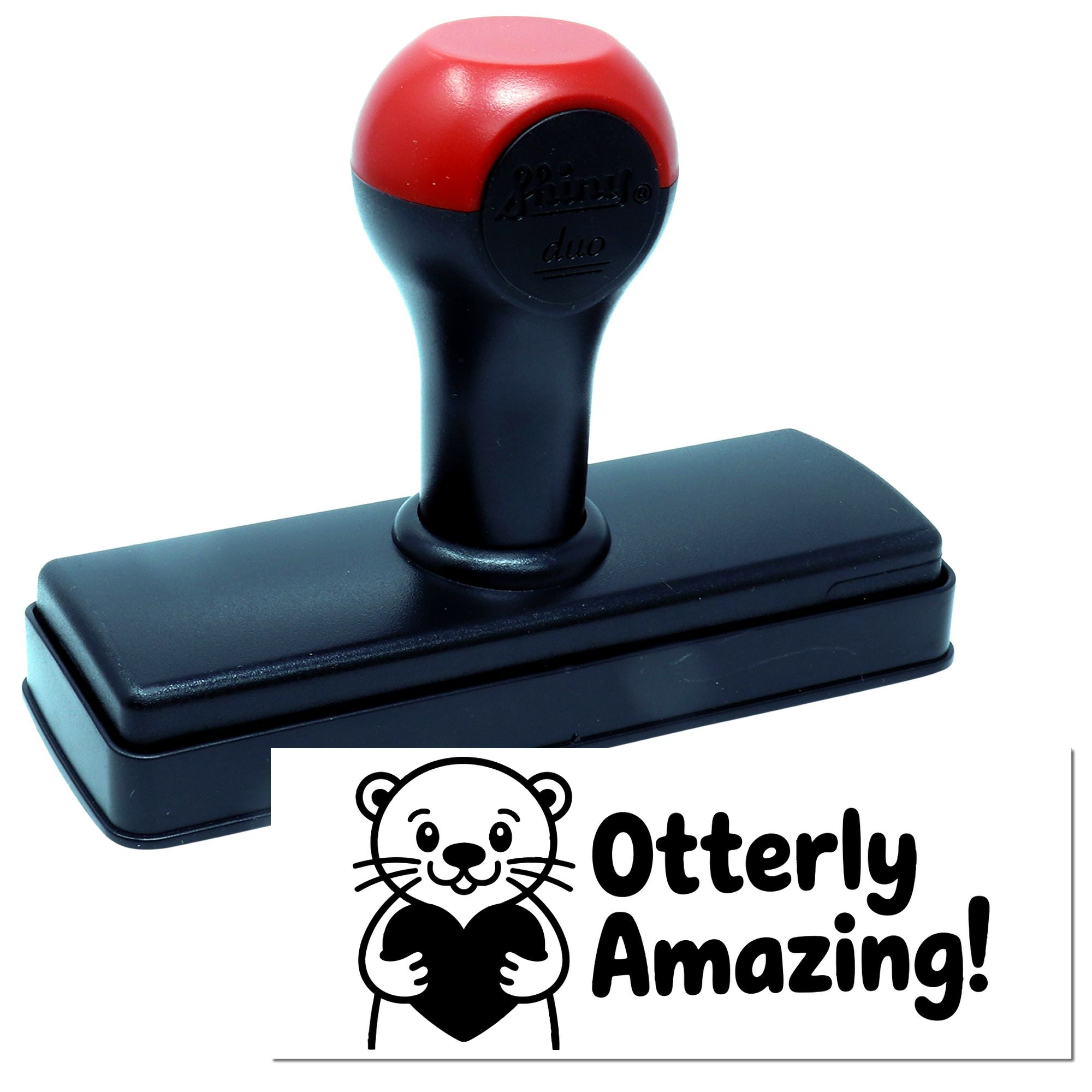 Custom self-inking rubber stamp with otter and heart design reading Otterly Amazing! for personalized crafting.