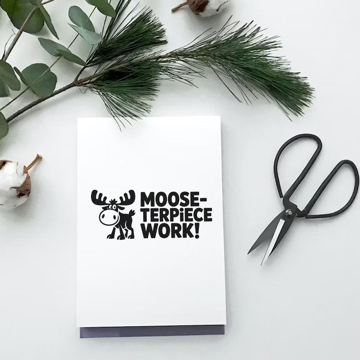 Funny Moose-Terpiece Work rubber stamp on handmade greeting card with crafting scissors and greenery.