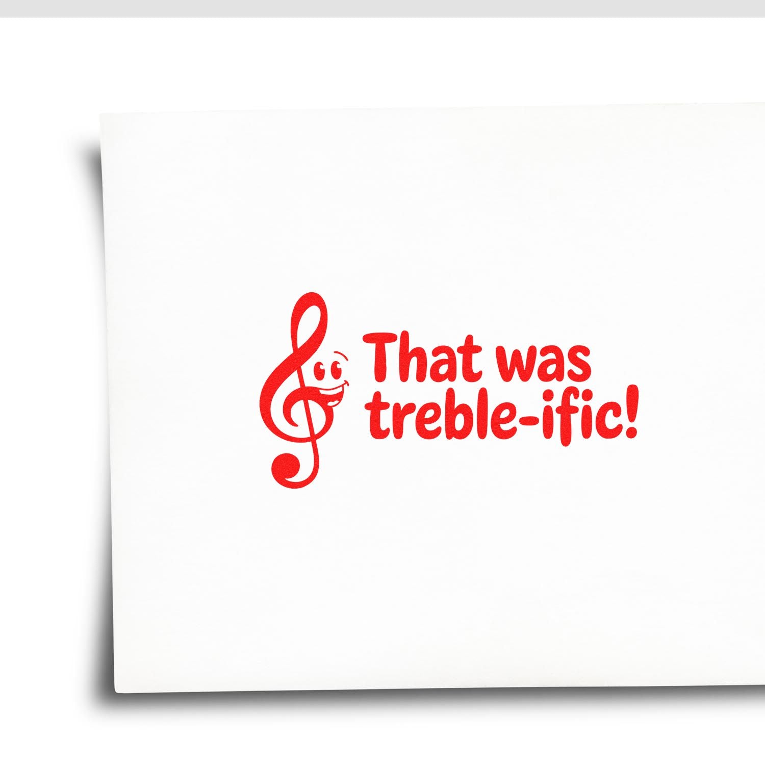 Red music rubber stamp with treble clef and That was treble-ific! pun for musicians and music teachers.