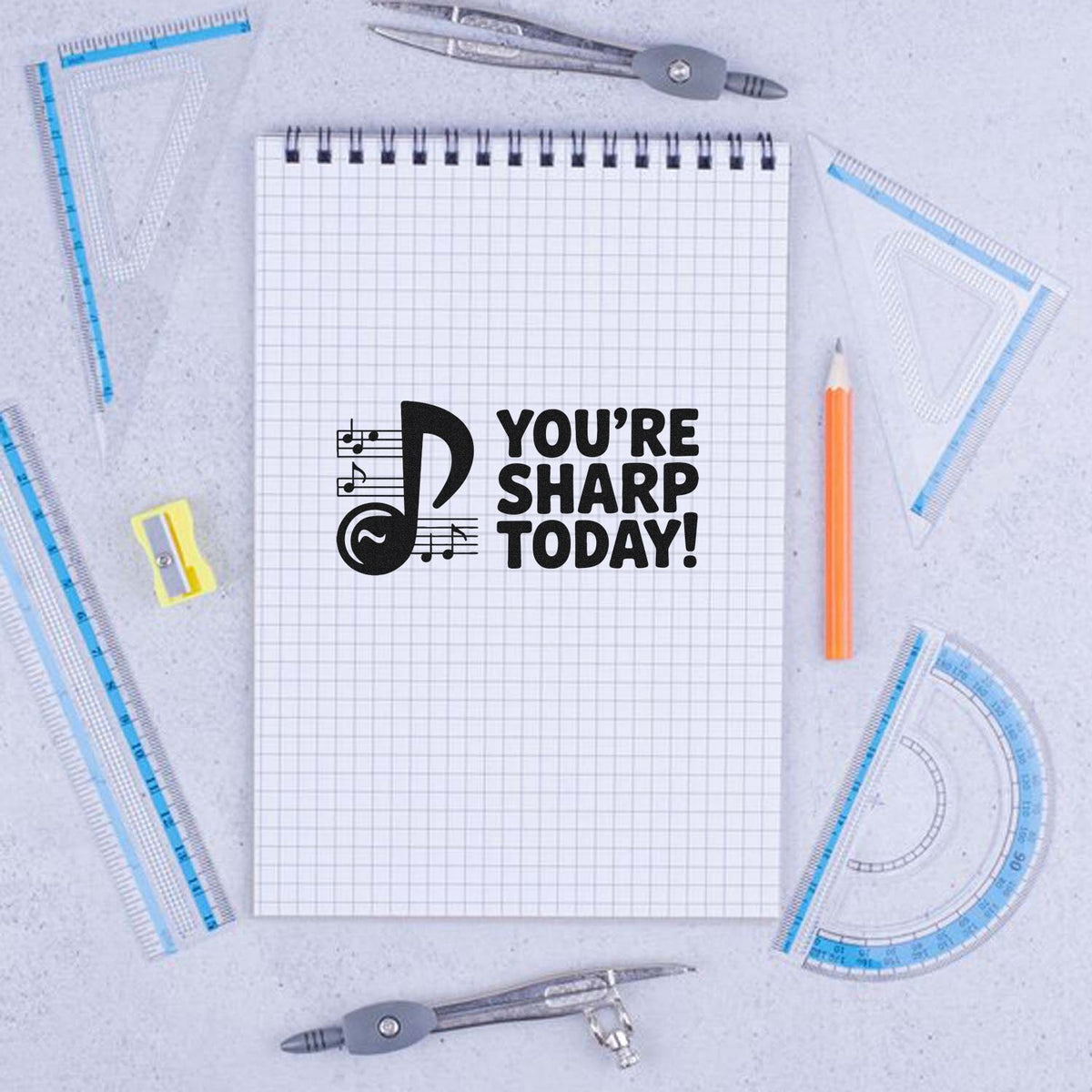 Youre Sharp Today teacher rubber stamp design with notebook, compass, pencil, and math tools for classroom use