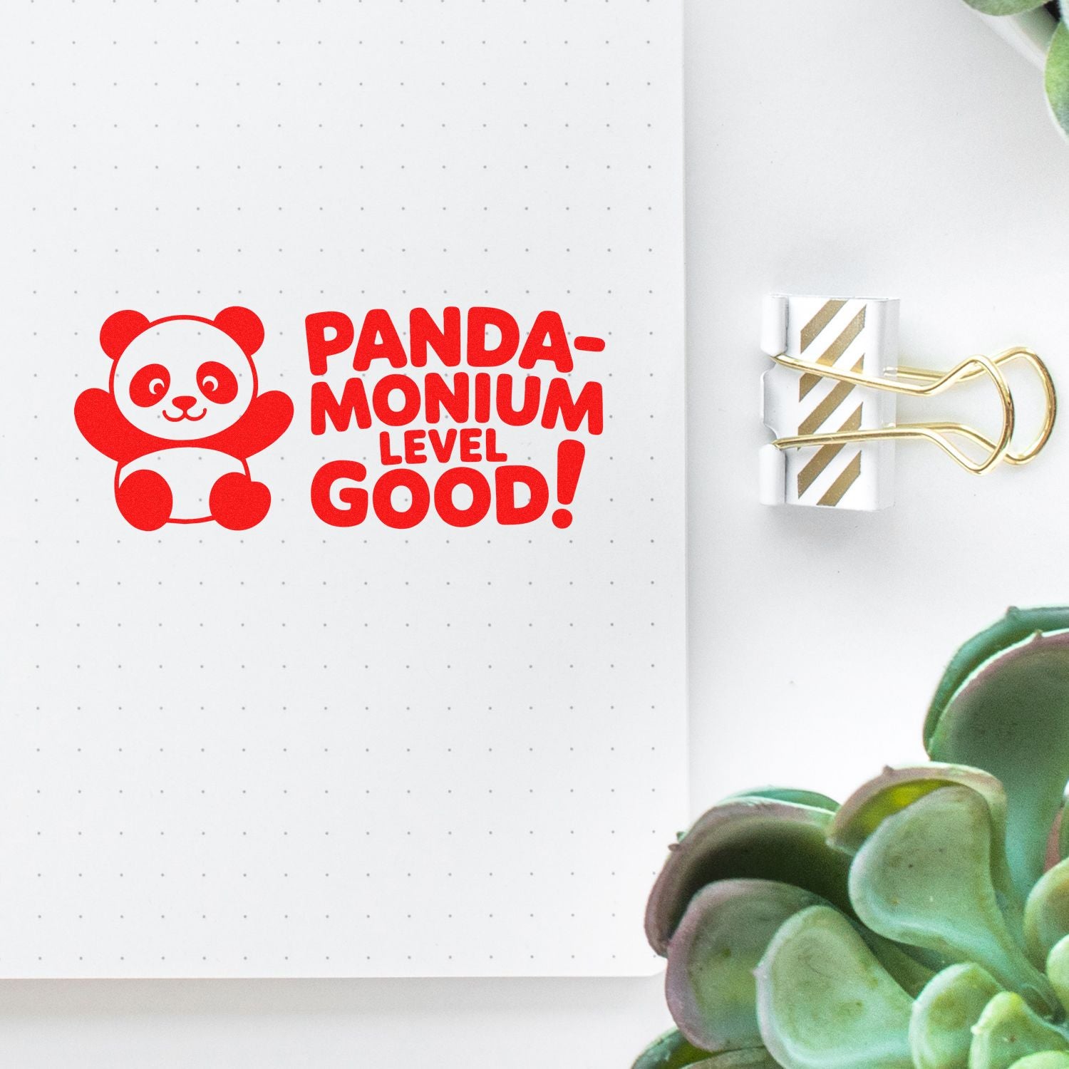 Panda-monium Level Good! red panda rubber stamp on dotted notebook page, perfect for fun planner and journal use.