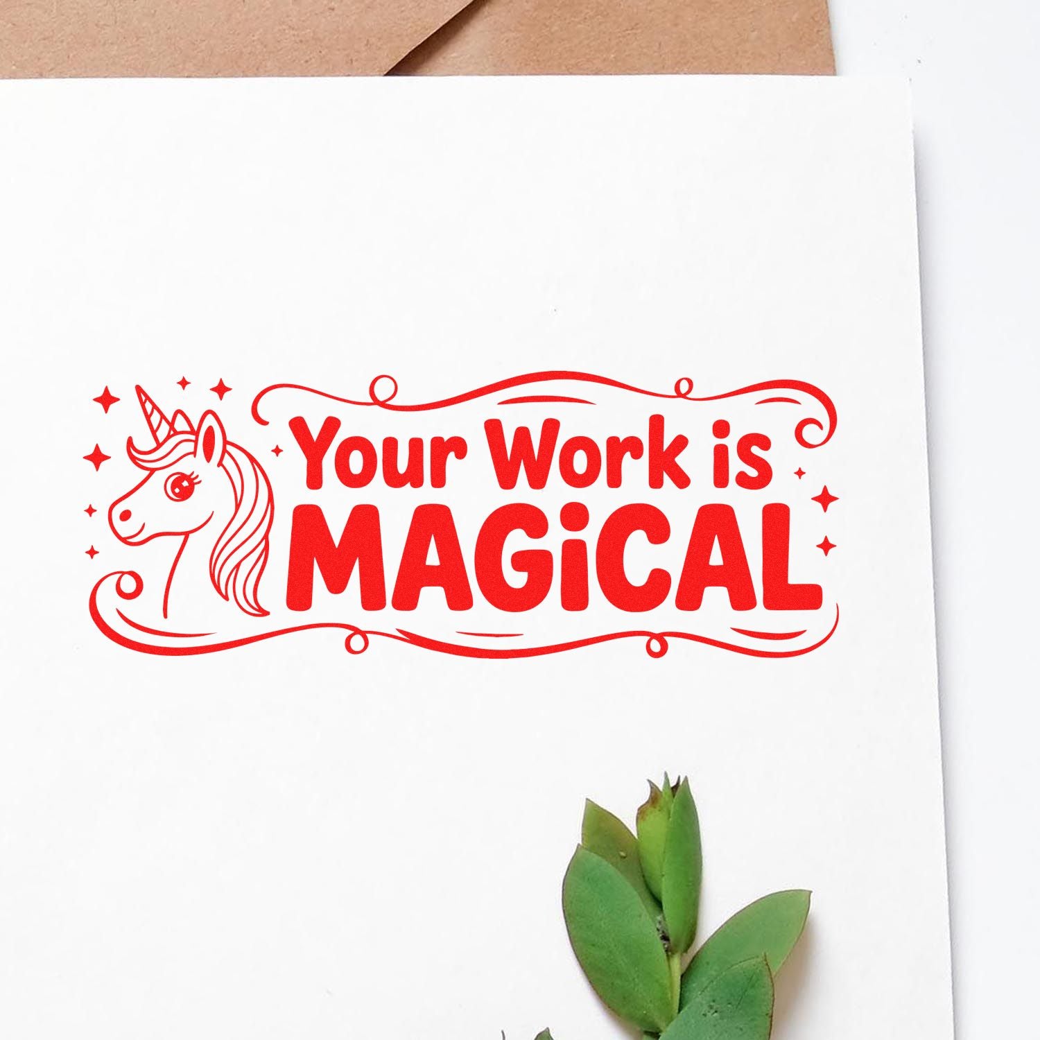 Unicorn rubber stamp impression with Your Work Is Magical in red ink on white paper, ideal for teacher gifts and craft projects.