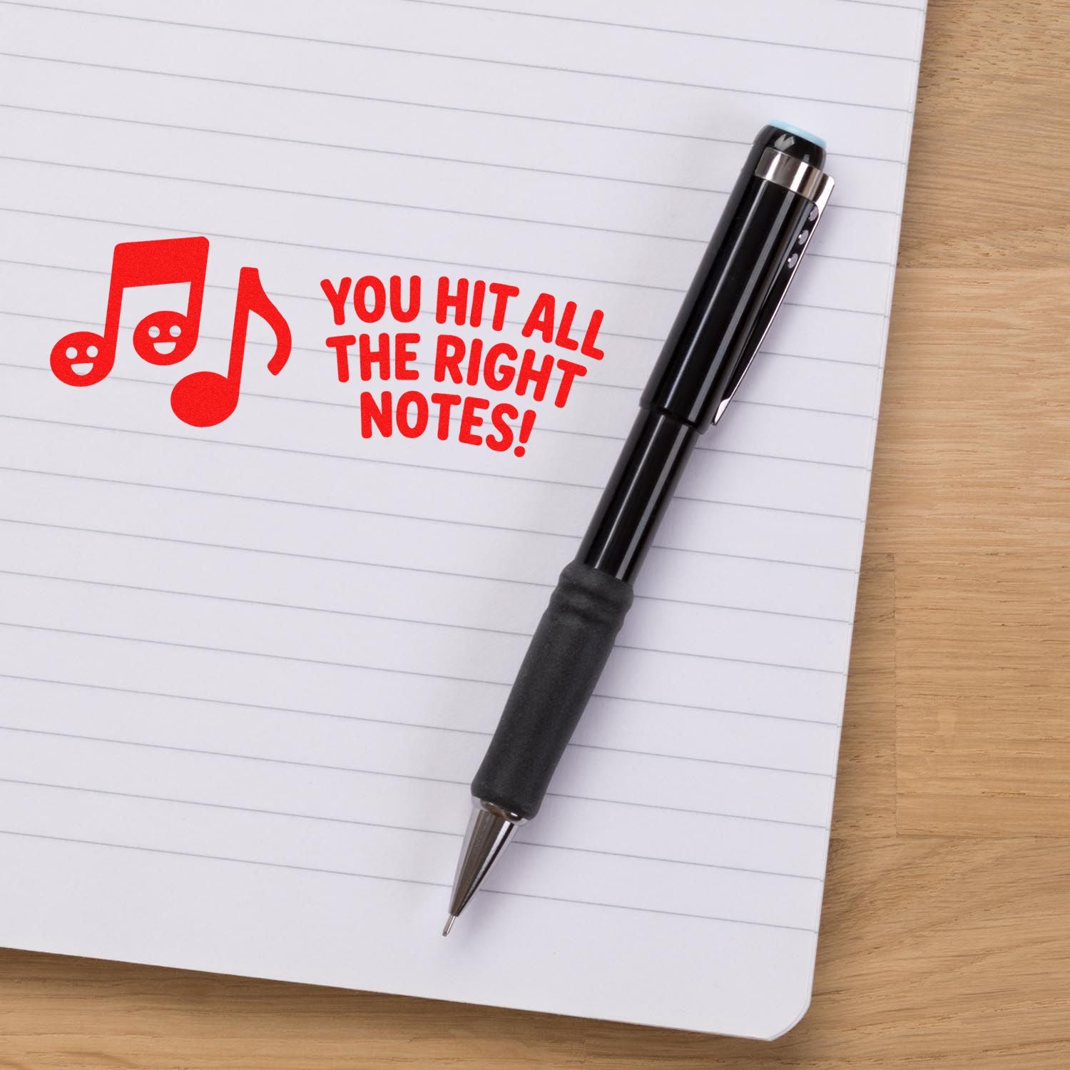 Music teacher rubber stamp saying You hit all the right notes! for rewarding student work.