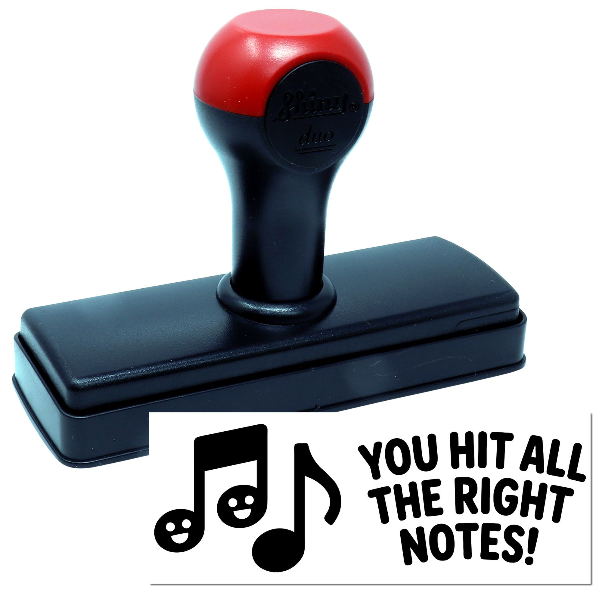 Custom self-inking rubber stamp with music notes and You Hit All the Right Notes! message for teachers and student awards.