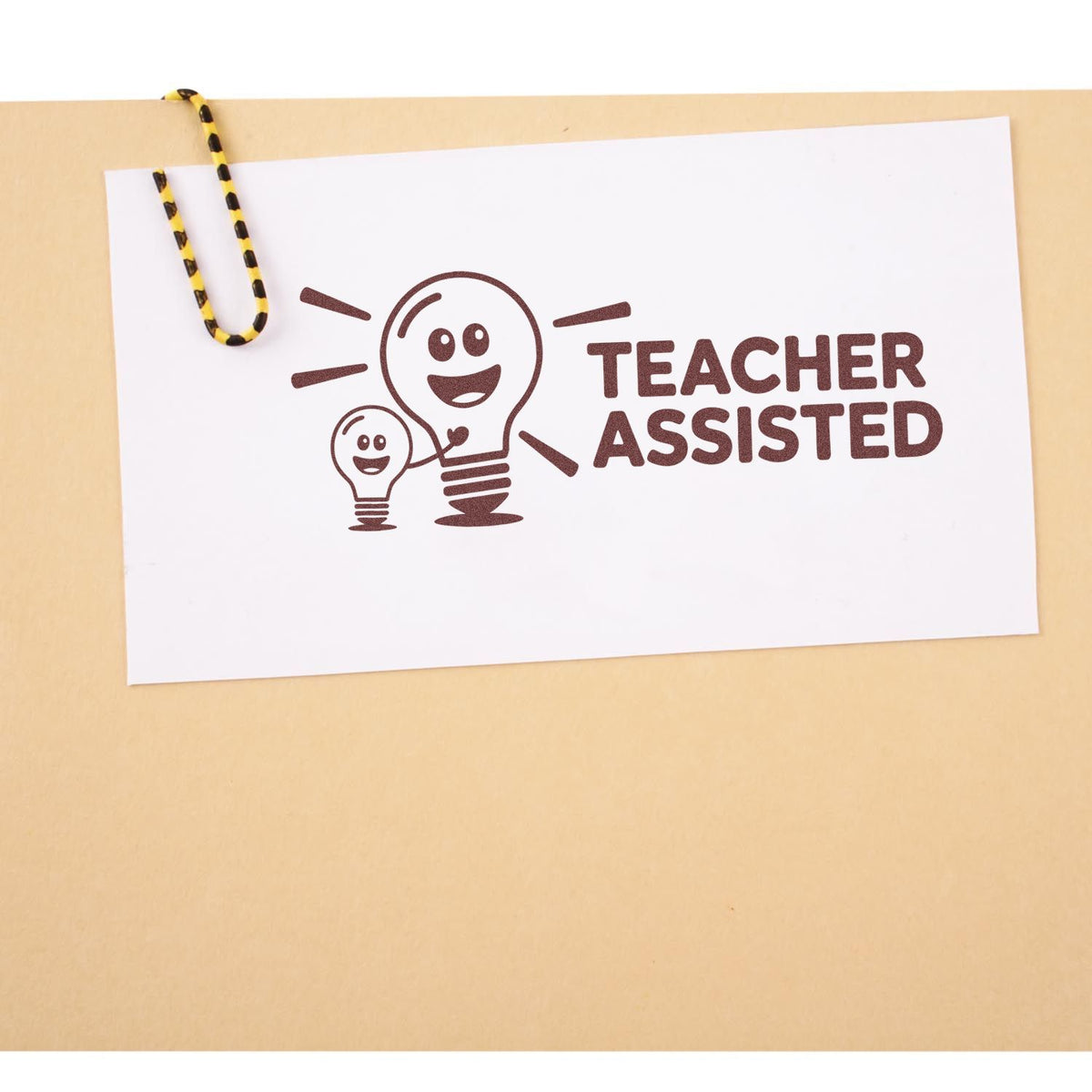 Teacher Assisted rubber stamp design with lightbulb icon, ideal for classroom feedback, education forms, and teacher use.