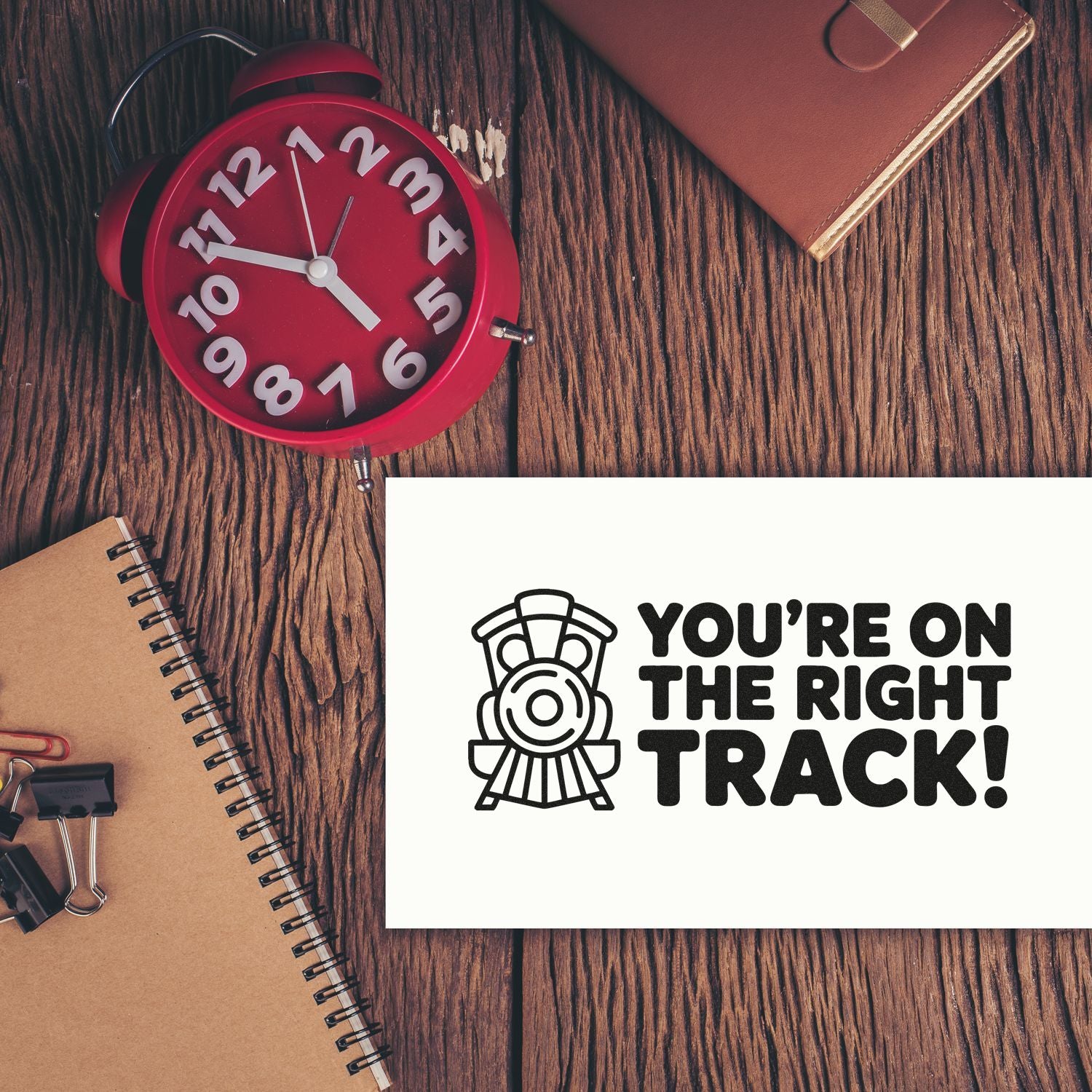 Train-themed rubber stamp design with Youre on the right track! message for motivational office, classroom, and planner use.