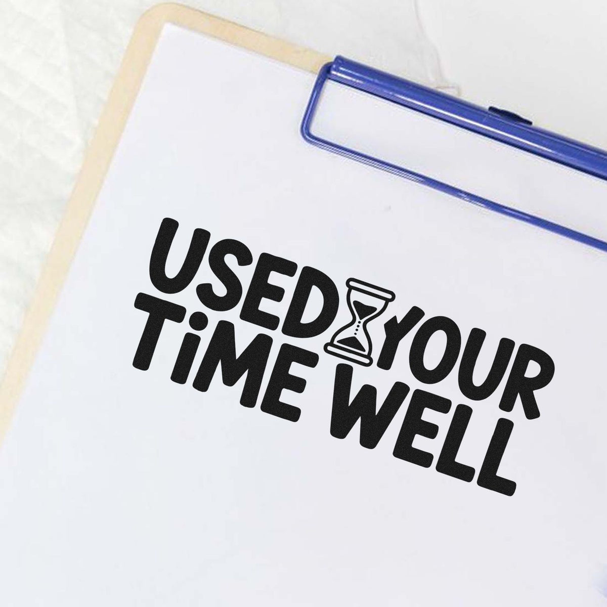 Custom rubber stamp design reading Used Your Time Well with hourglass icon for office or classroom use.