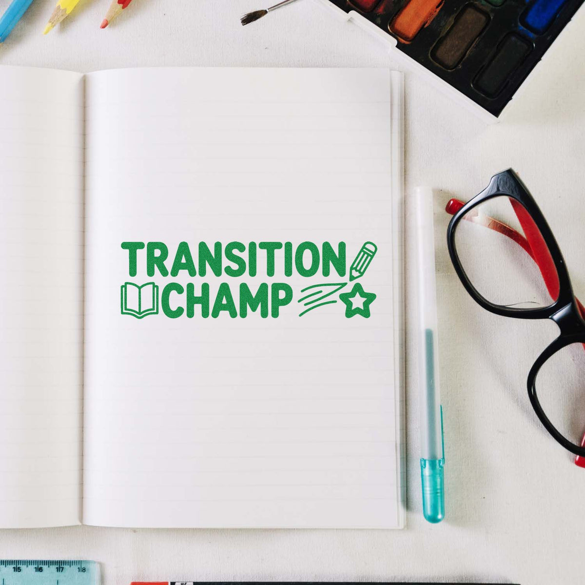 Transition Champ rubber stamp mockup on notebook for classroom rewards, student motivation, and education branding.