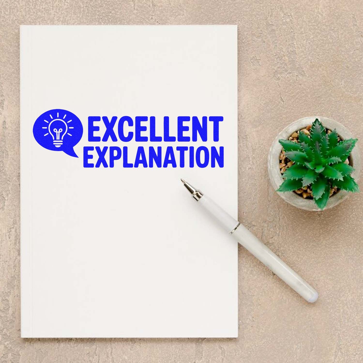 Excellent Explanation rubber stamp impression with lightbulb icon on paper, ideal for teacher feedback and office stamps.