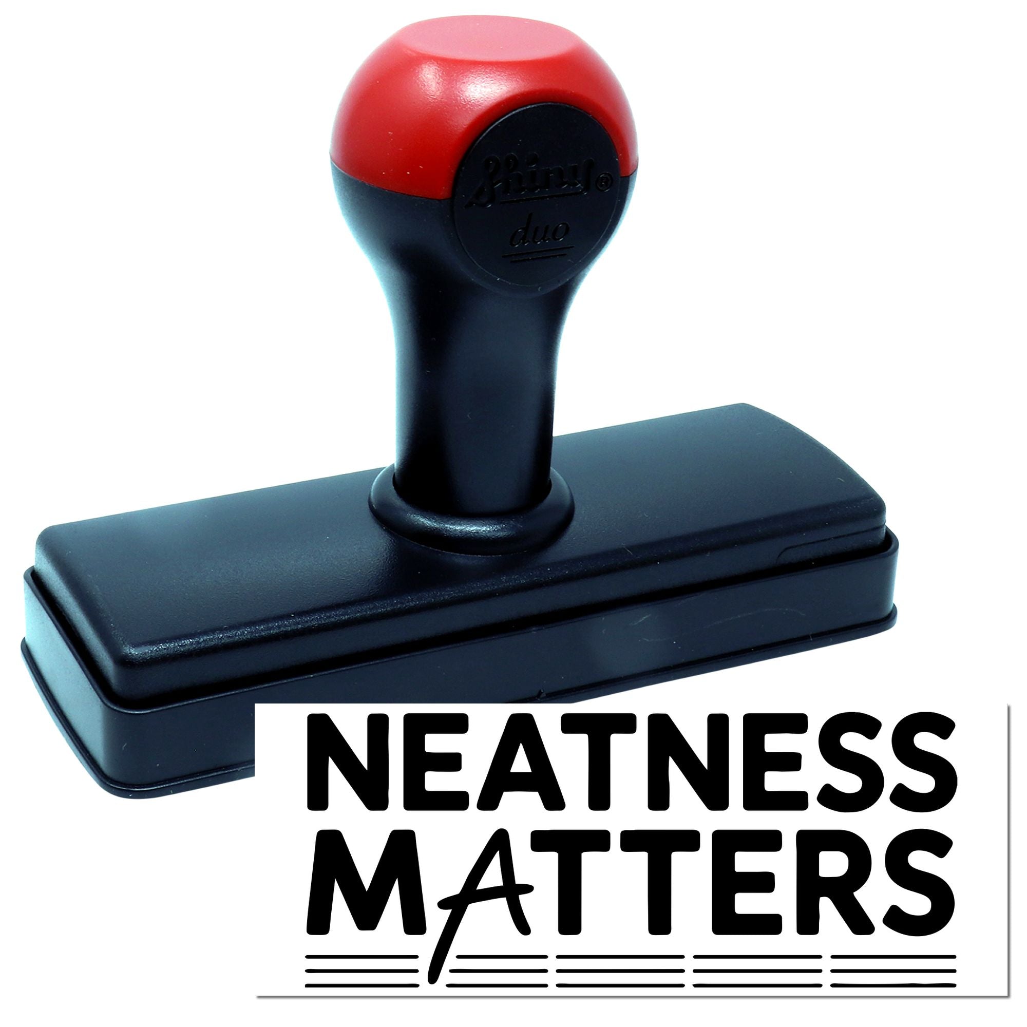Self-inking rubber stamp with Neatness Matters imprint for clean, professional office marking.