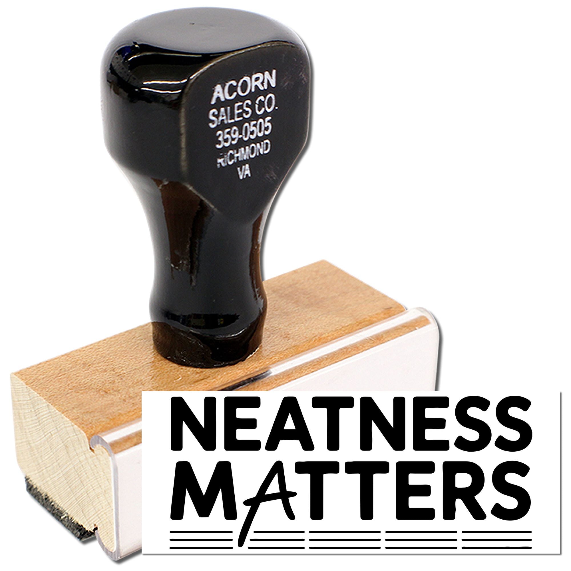 Wooden rubber stamp with Neatness Matters design for custom business stamping and office branding.