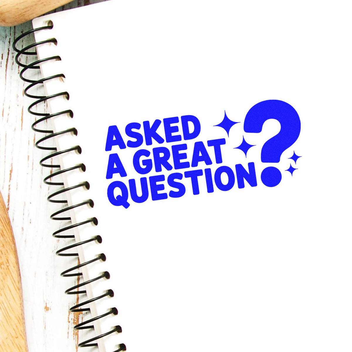 Blue Asked a Great Question? rubber stamp design on a spiral notebook, ideal for classroom or office praise.