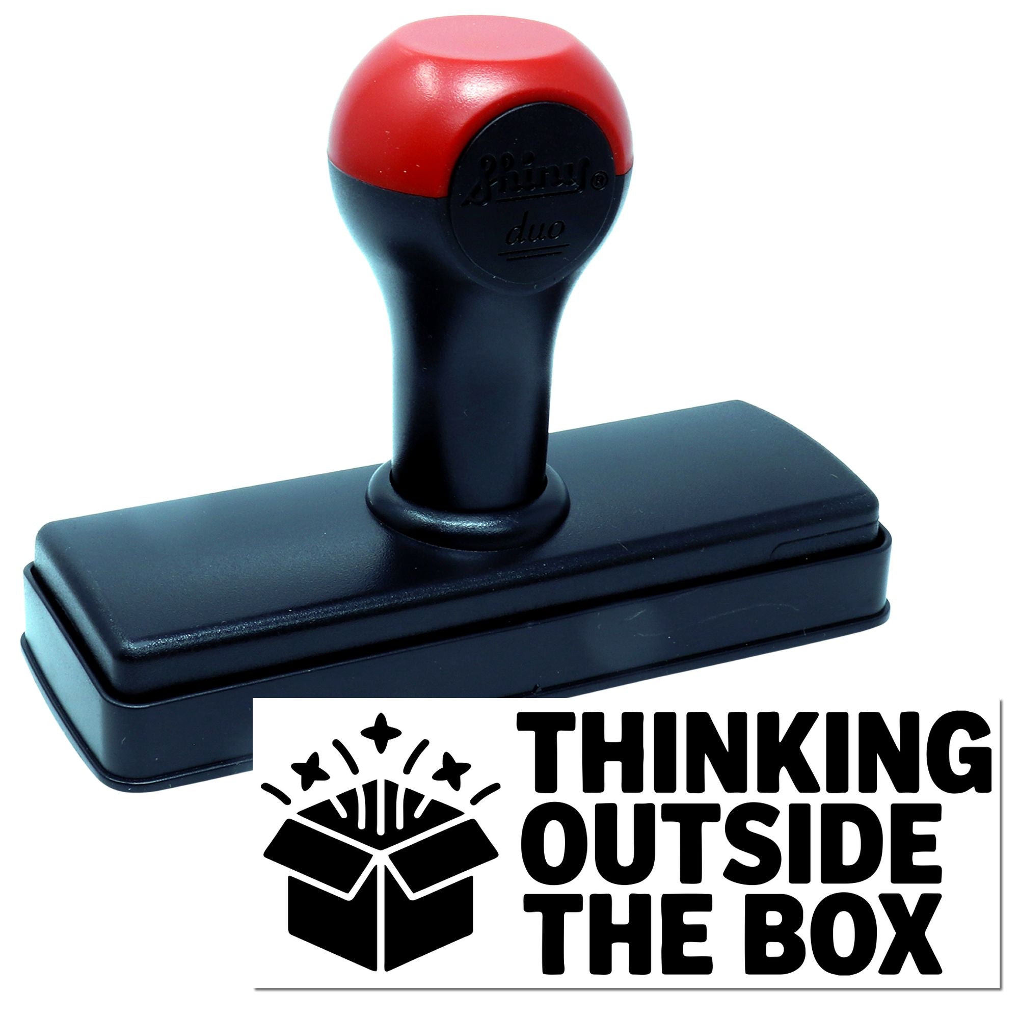 Self-inking rubber stamp with Thinking Outside the Box imprint, ideal for creative business branding.