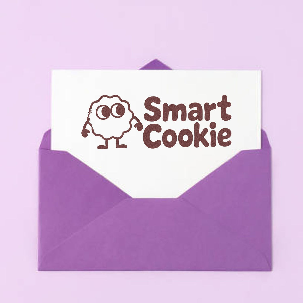 Smart Cookie rubber stamp design on a purple envelope, featuring a cute cookie character for bakery packaging or stationery.