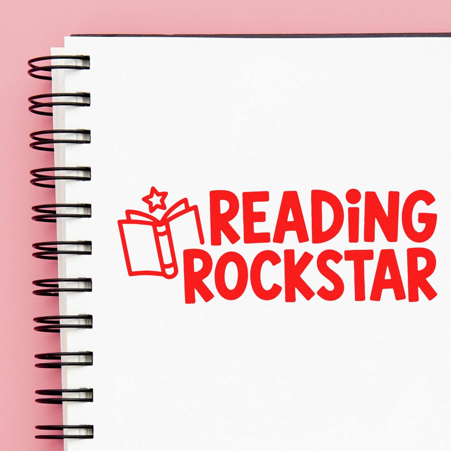 Reading Rockstar rubber stamp design on notebook page with book icon, perfect for teacher rewards and reading incentive gifts.