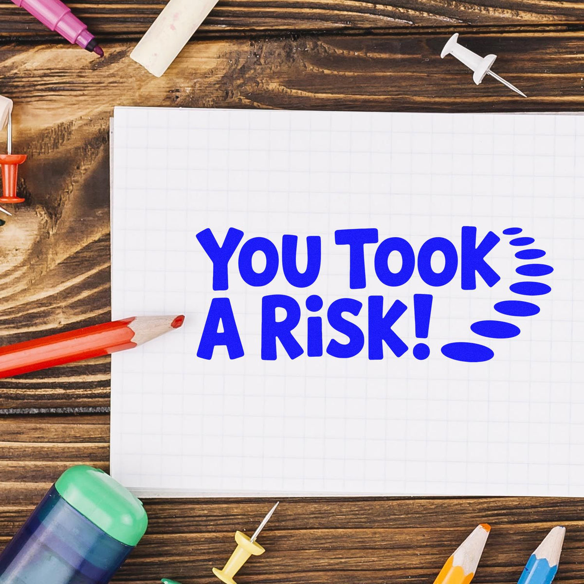 Rubber stamp design reading You Took a Risk! for bold journaling, scrapbooking, and planner projects.