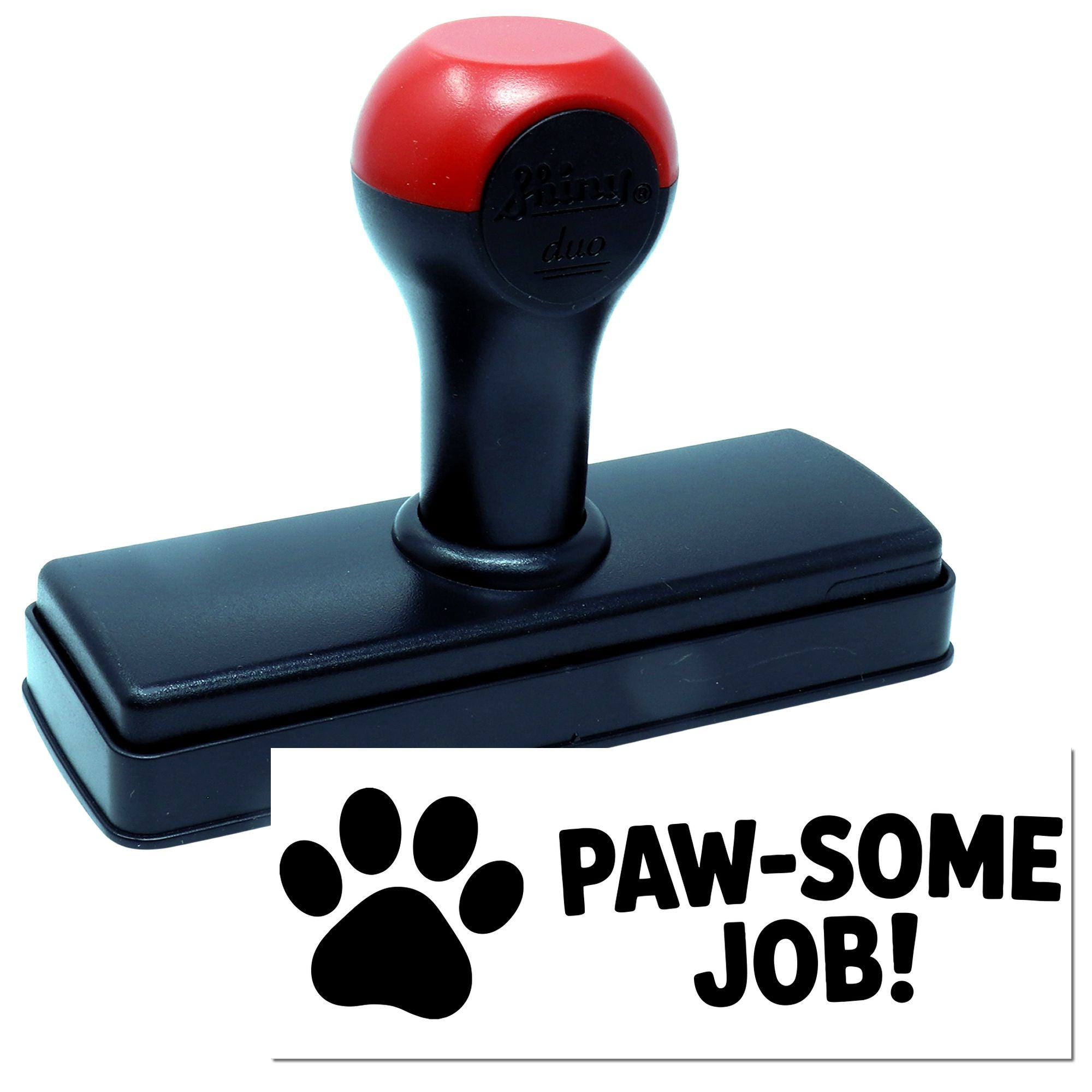 Self-inking rubber stamp with paw print design and PAW-SOME JOB! impression for pet reward and praise.