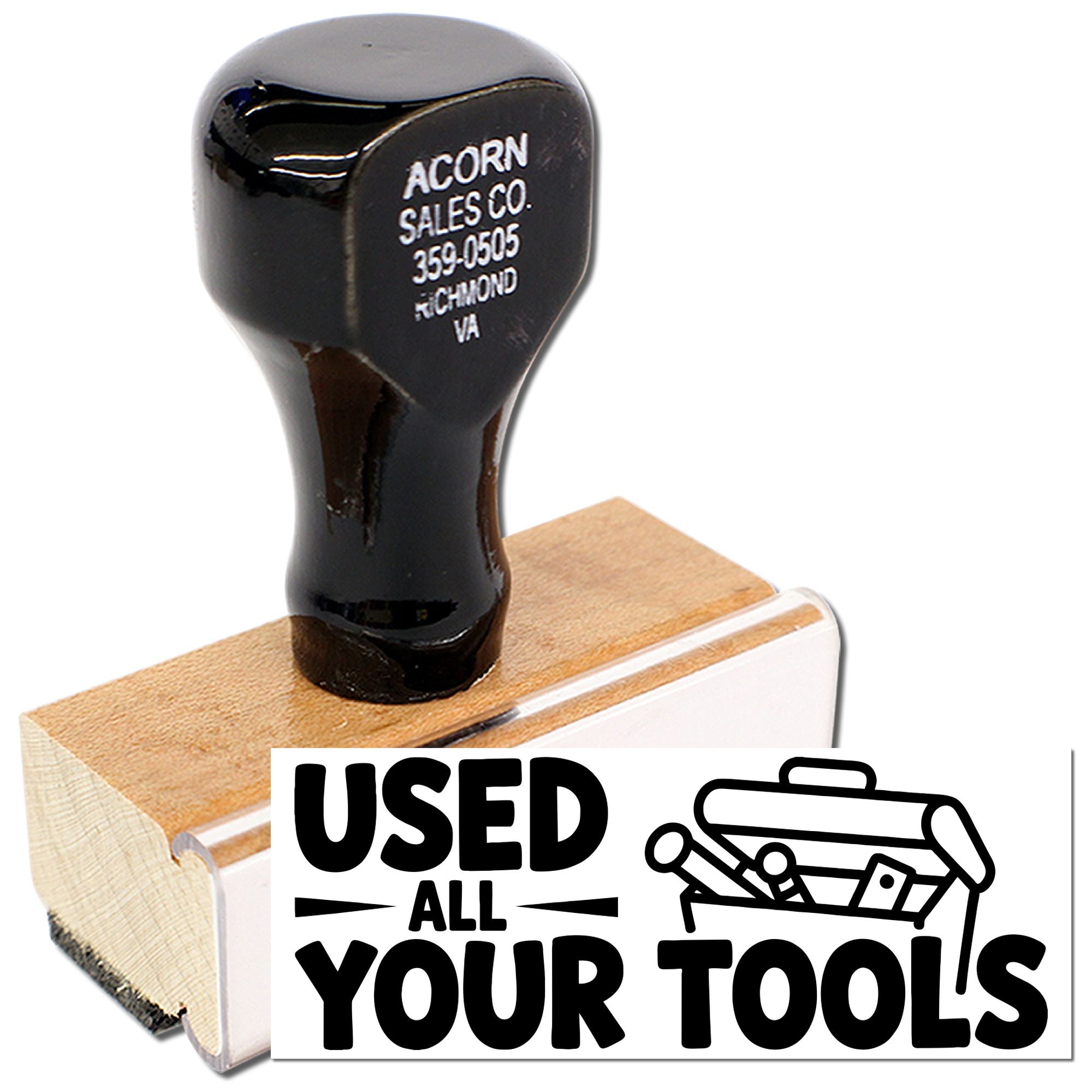 Wooden-handled custom rubber stamp with Used All Your Tools design for workshop branding and tool shop promotions.
