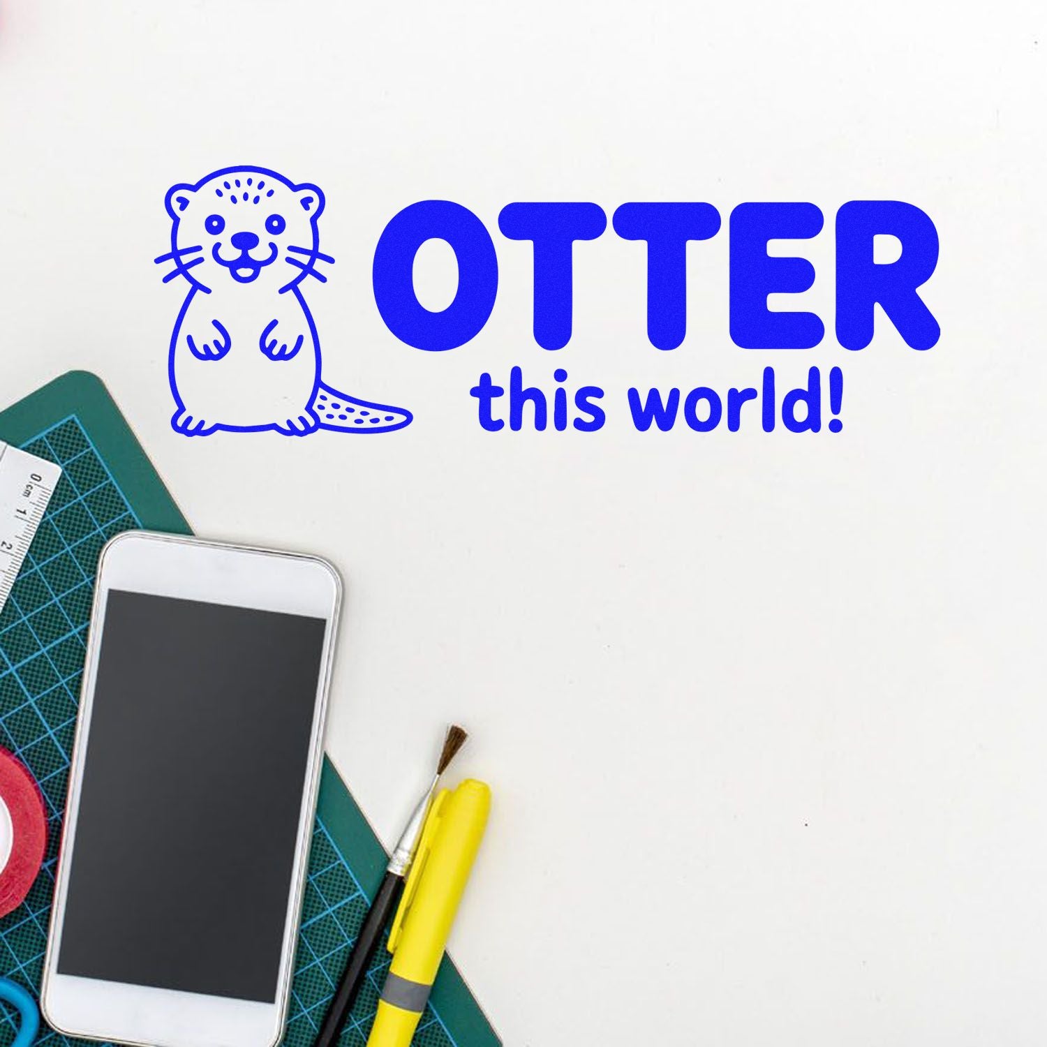 Otter this world rubber stamp design with cute otter and bold lettering for handmade cards, scrapbooking, and crafts.