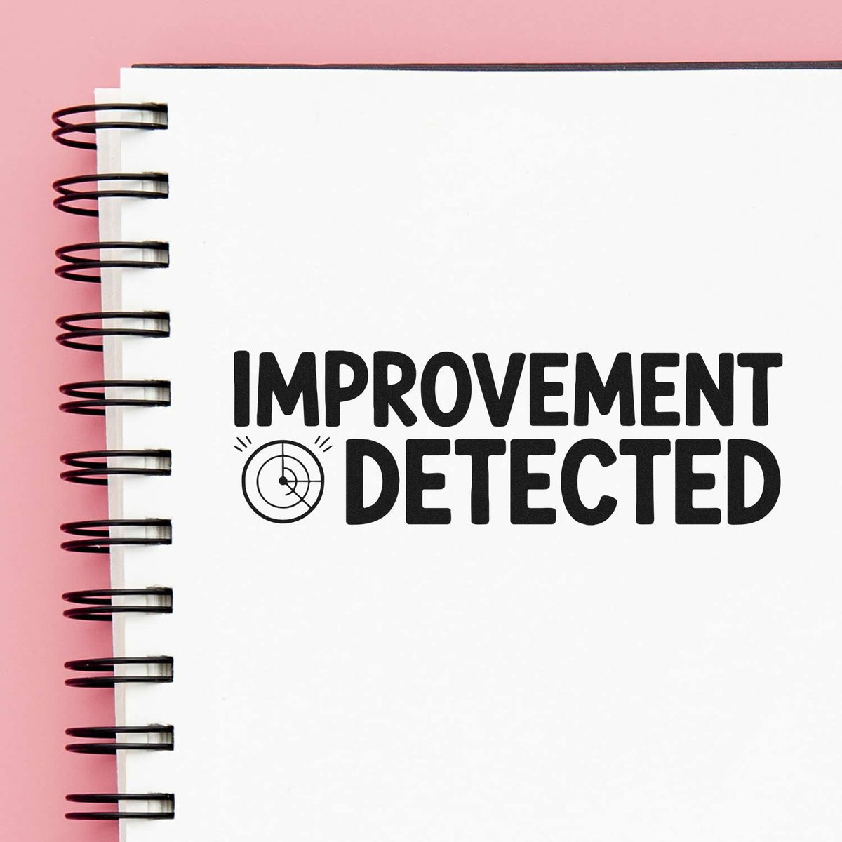 Improvement Detected rubber stamp design for feedback, quality control, and office approval on notebook paper.