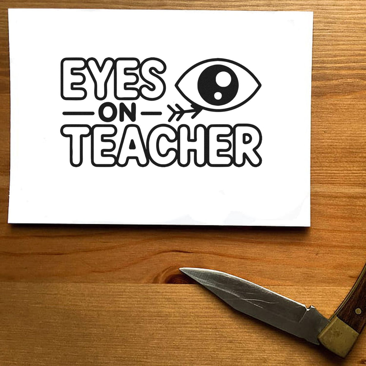 Eyes on Teacher rubber stamp design with eye icon, ideal for classroom teacher supplies and school craft projects.