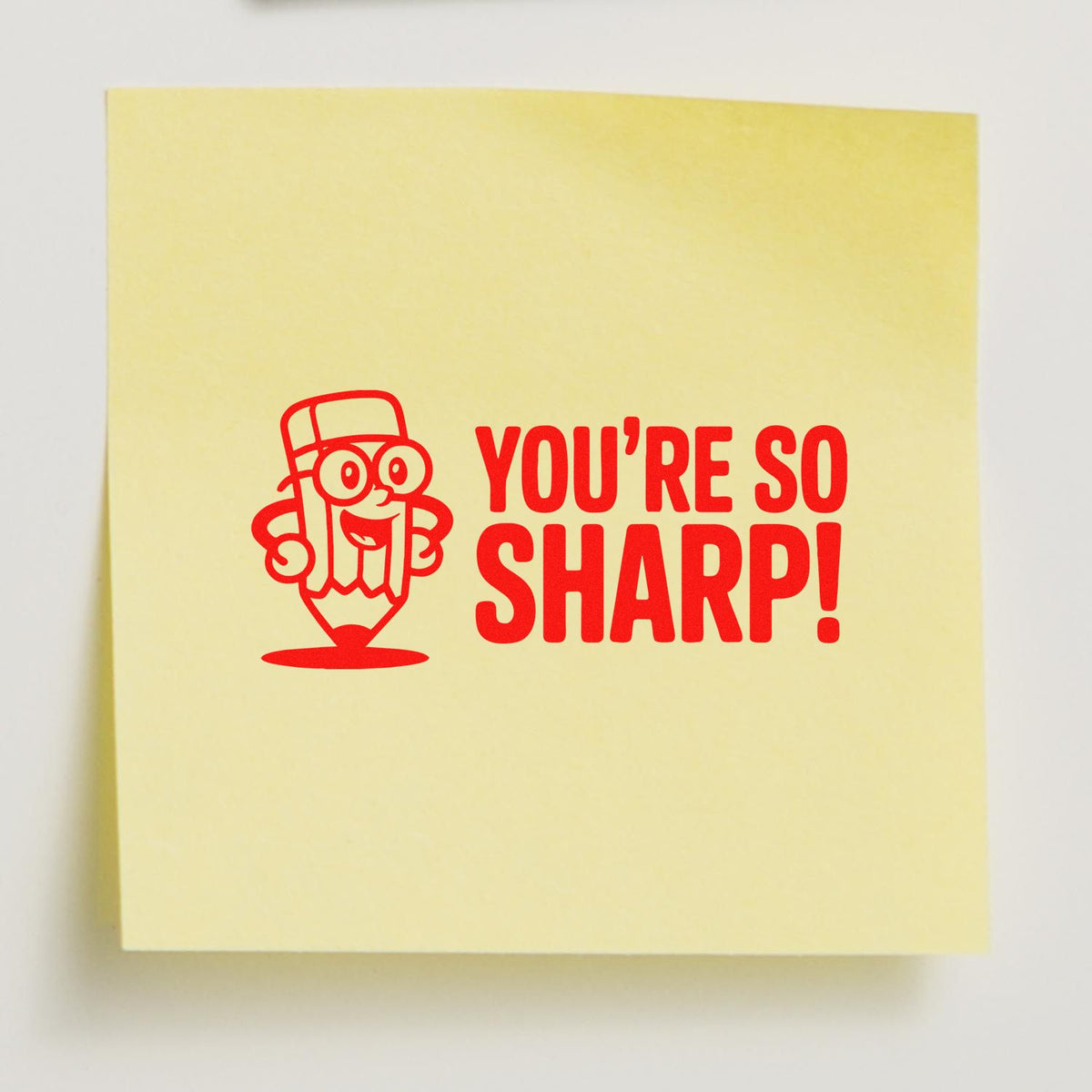 Custom rubber stamp design with a pencil mascot and "You're So Sharp!" text, perfect for office, school, or teacher use.