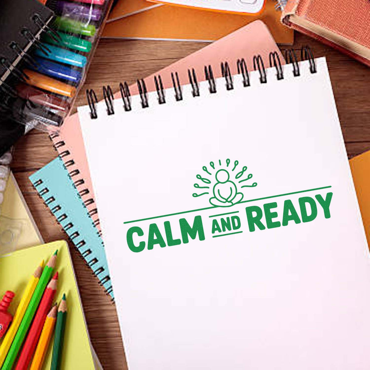 Calm and Ready rubber stamp design on a notebook, perfect for planners, classroom supplies, and mindfulness stationery.