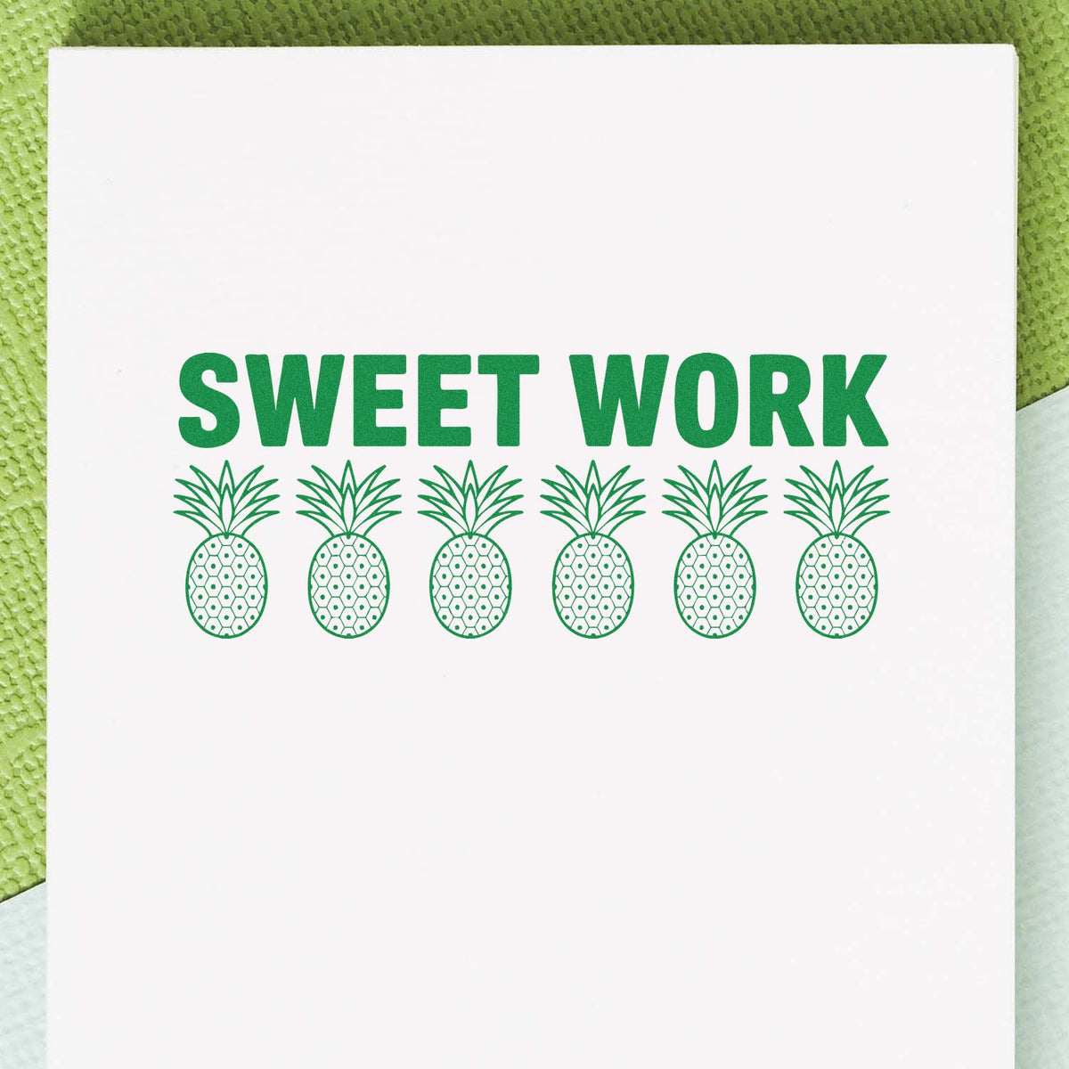 Sweet Work pineapple rubber stamp design with bold green text and six pineapples, ideal for handmade thank-you cards.