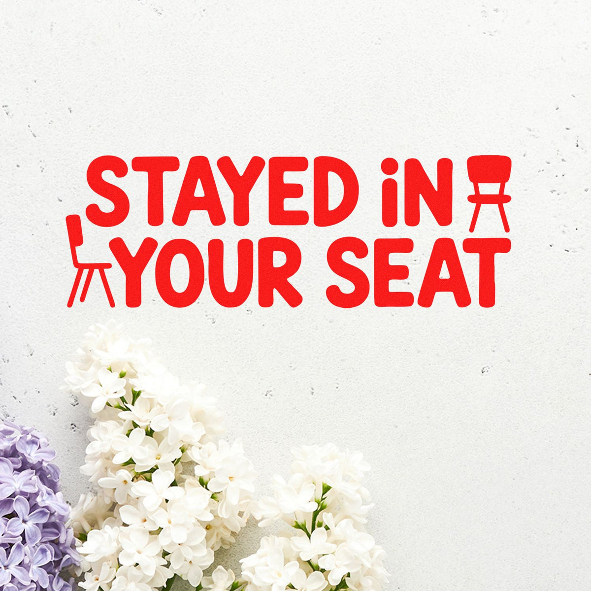 Funny rubber stamp design reading Stayed in Your Seat with chair icons and floral accents for classroom or event rewards.