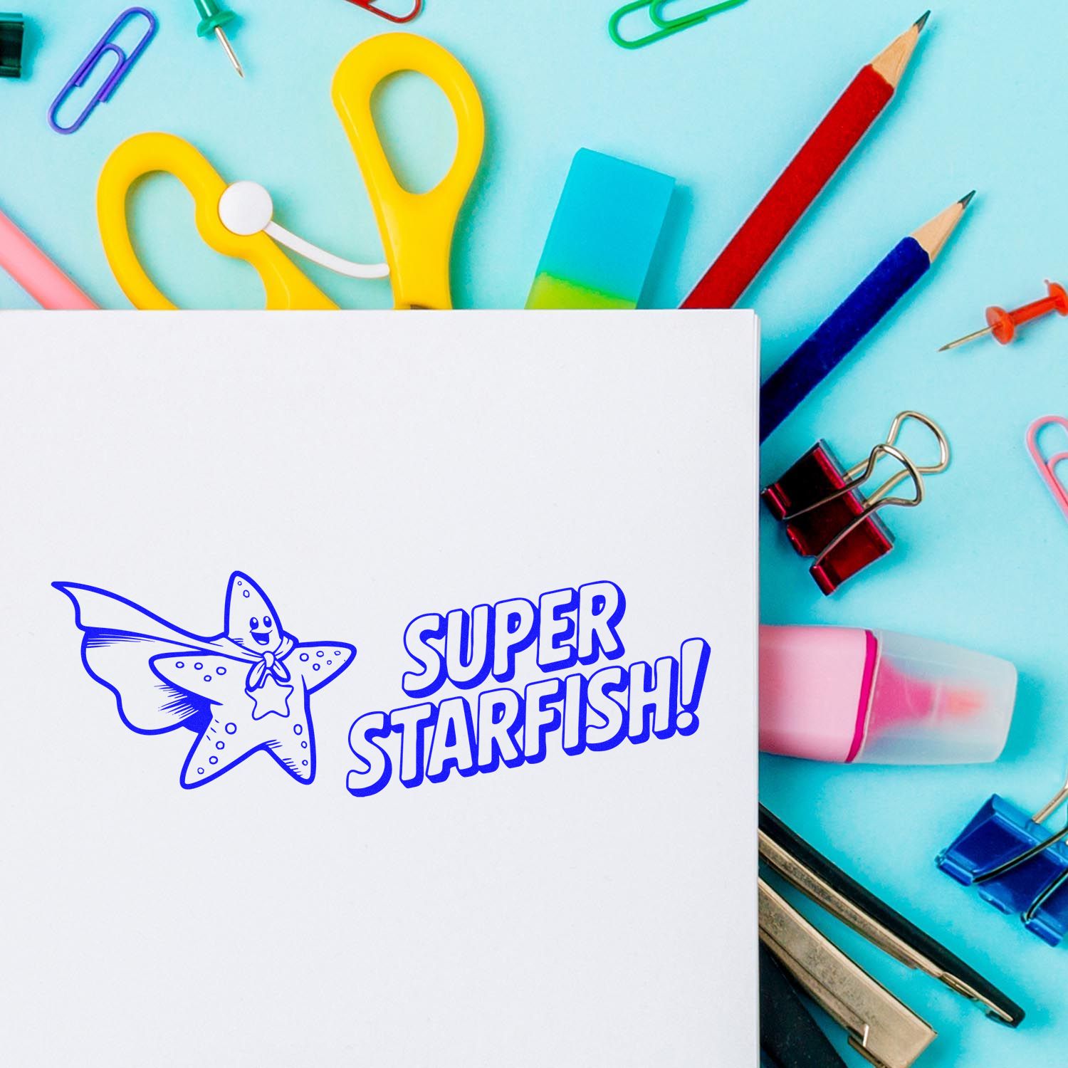 Custom rubber stamp impression reading Super Starfish! with superhero starfish art on stationery paper for teacher rewards.