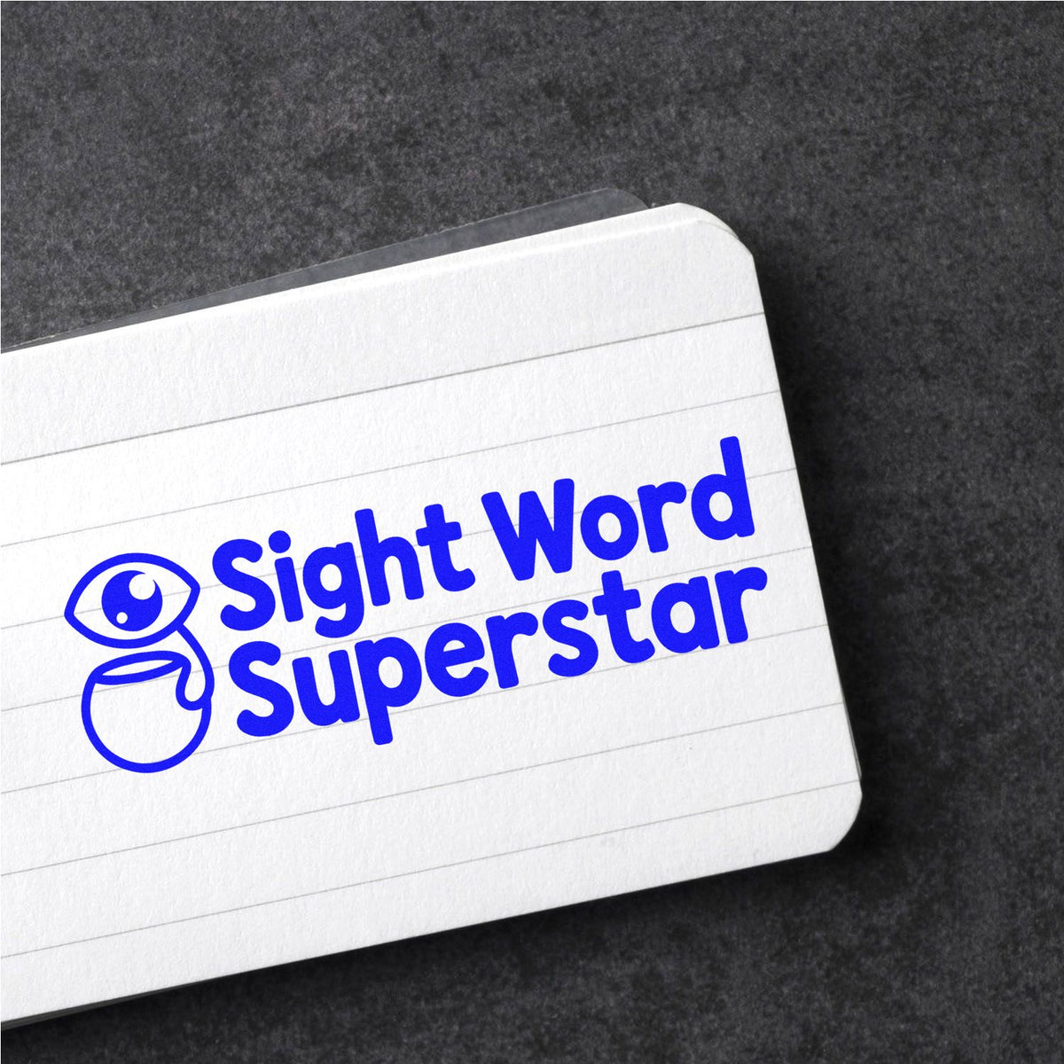 Sight Word Superstar rubber stamp design with eye icon, perfect for rewarding students in reading and literacy activities.