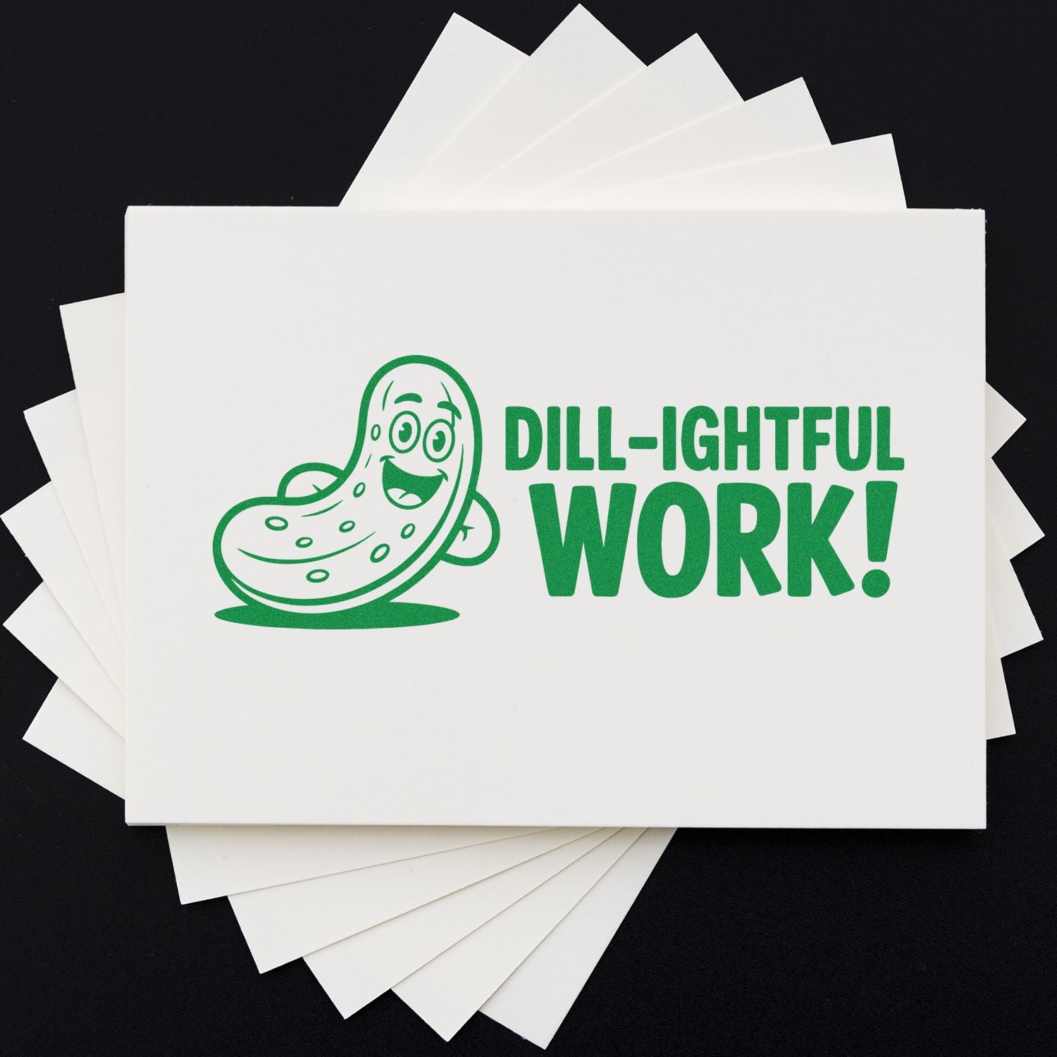 Custom rubber stamp design with smiling pickle and Dill-ightful Work! text on white cards, ideal for fun packaging.
