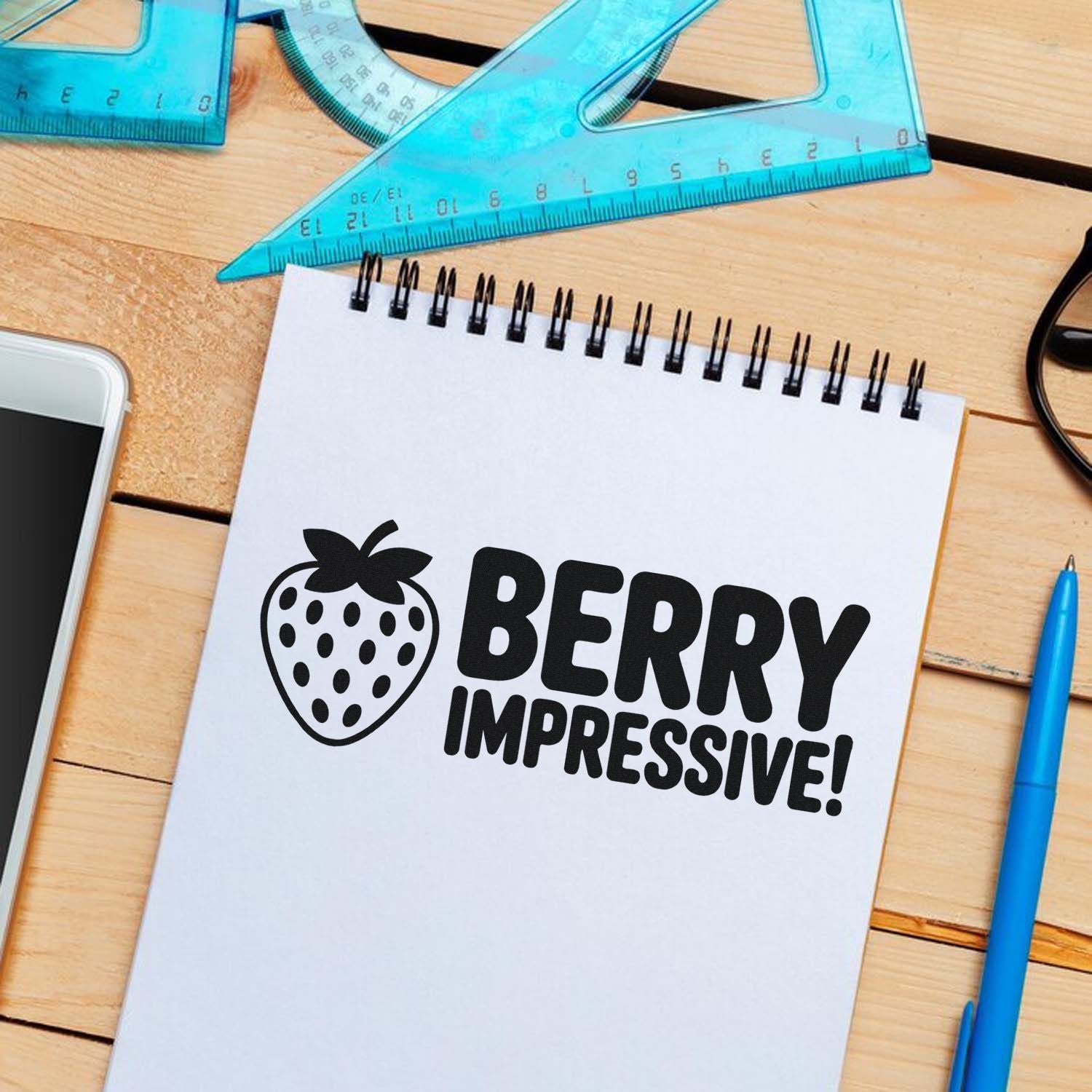 Berry impressive strawberry rubber stamp design on notebook for crafting, teacher rewards, and packaging.