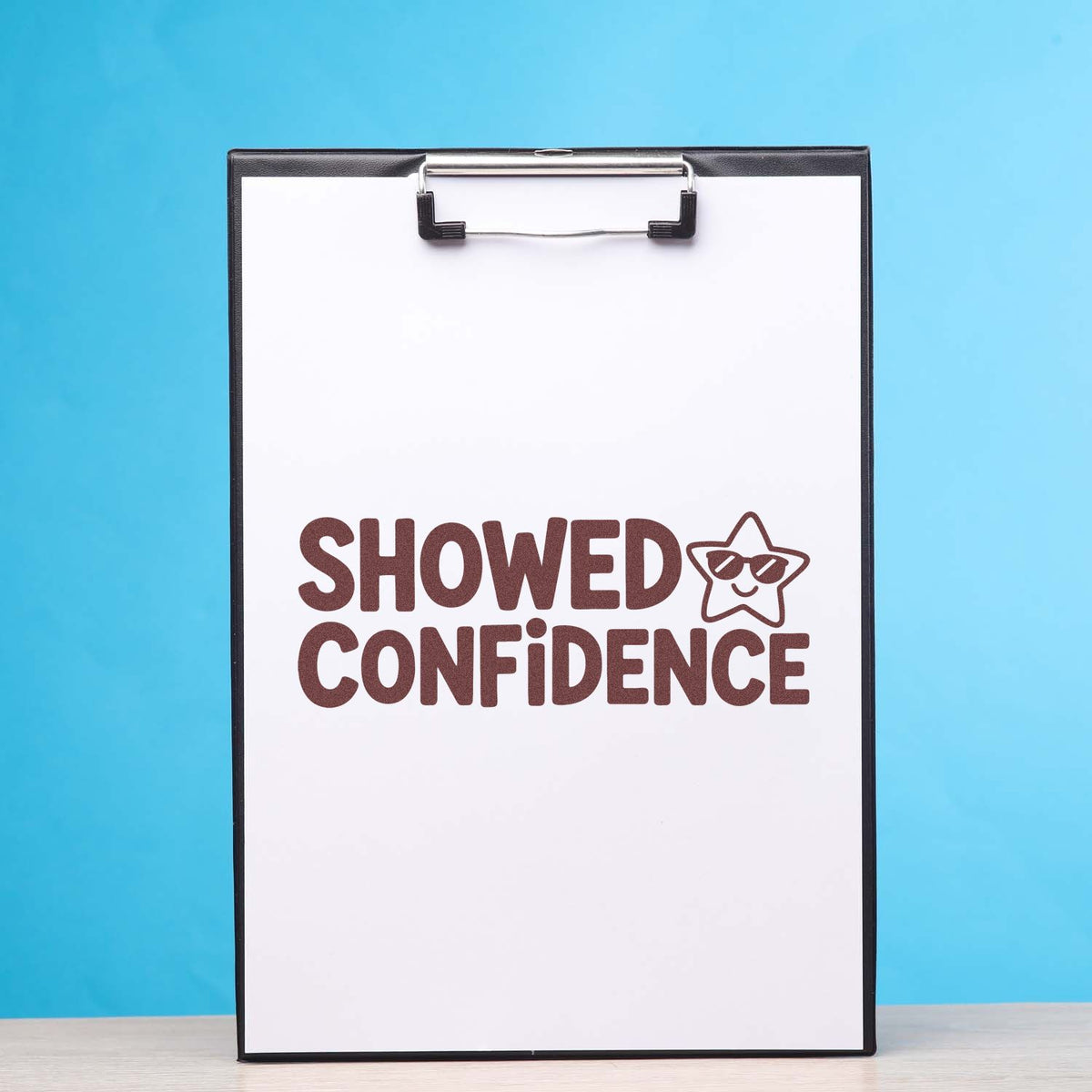 Confidence rubber stamp design with star icon and bold Showed Confidence text for motivational classroom or reward use.