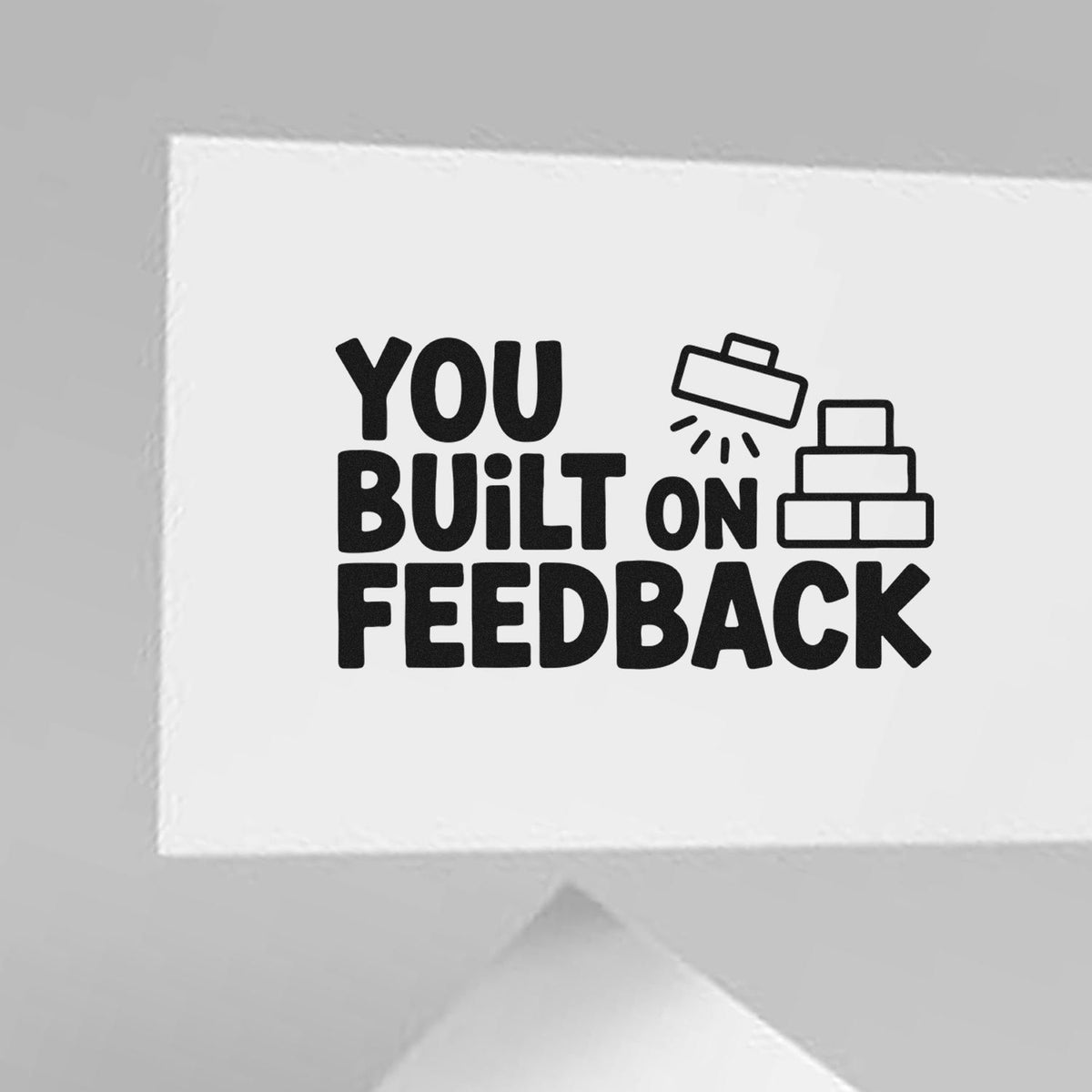 Rubber stamp reading You Built on Feedback with brick icons, ideal for teacher, business, or customer appreciation.