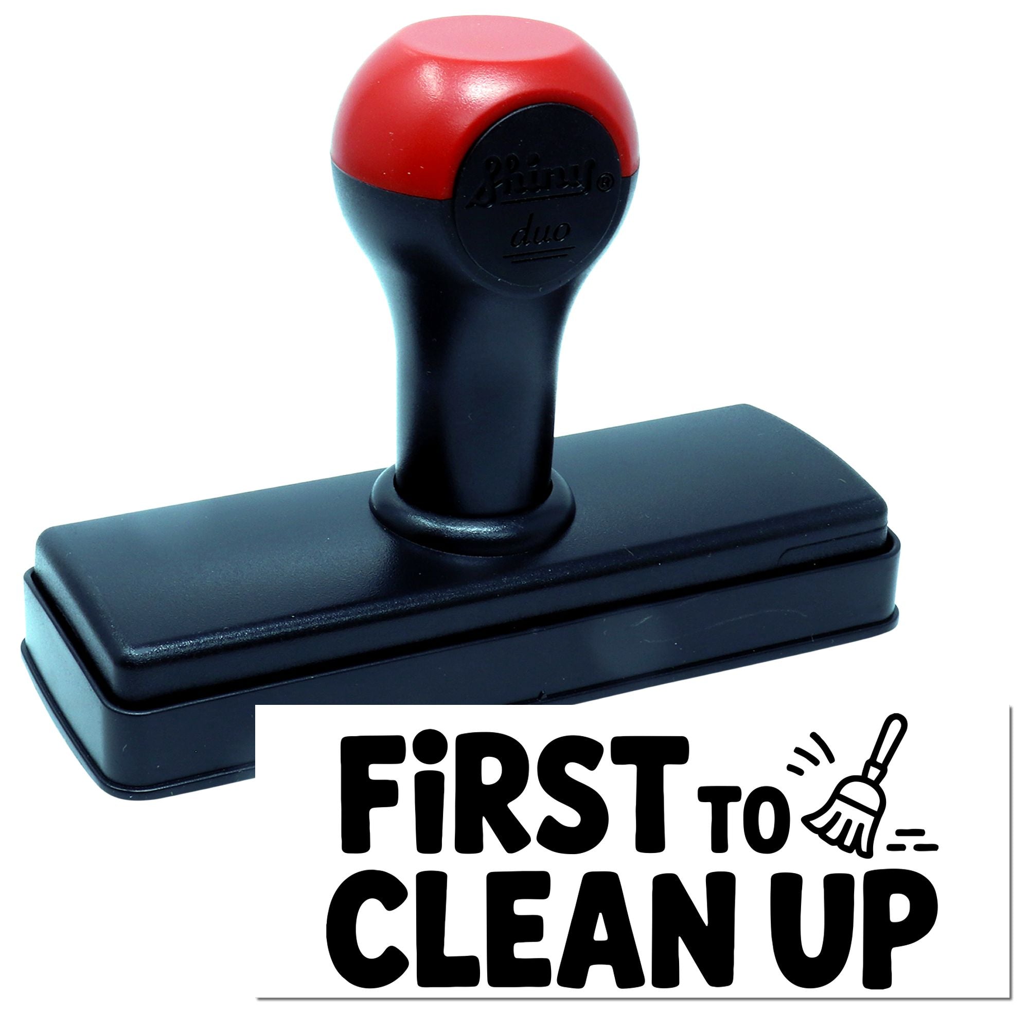 Self-inking rubber stamp with First to Clean Up message for classroom behavior rewards and teacher use.
